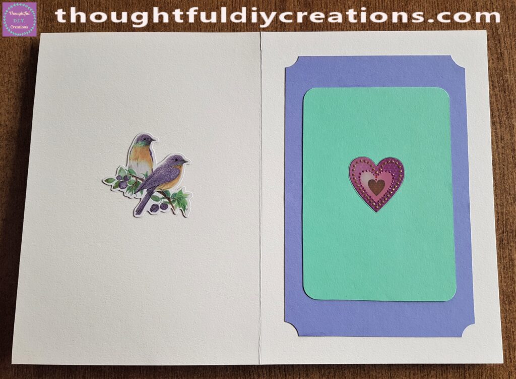 I glued a Bird and Berry Element to the Card with PrittStick. I added a Heart Sticker to the right side of the Inner Card.