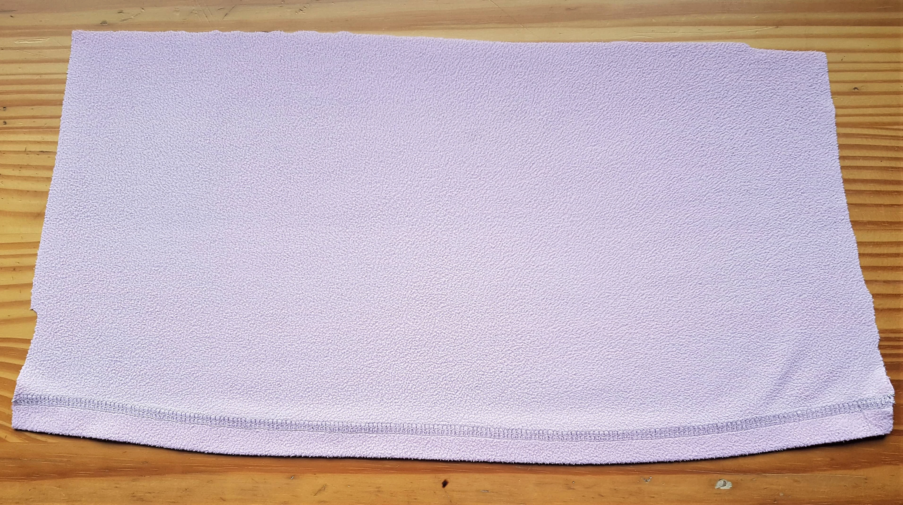 I Ironed the fleece on the Cotton Setting with No Steam.