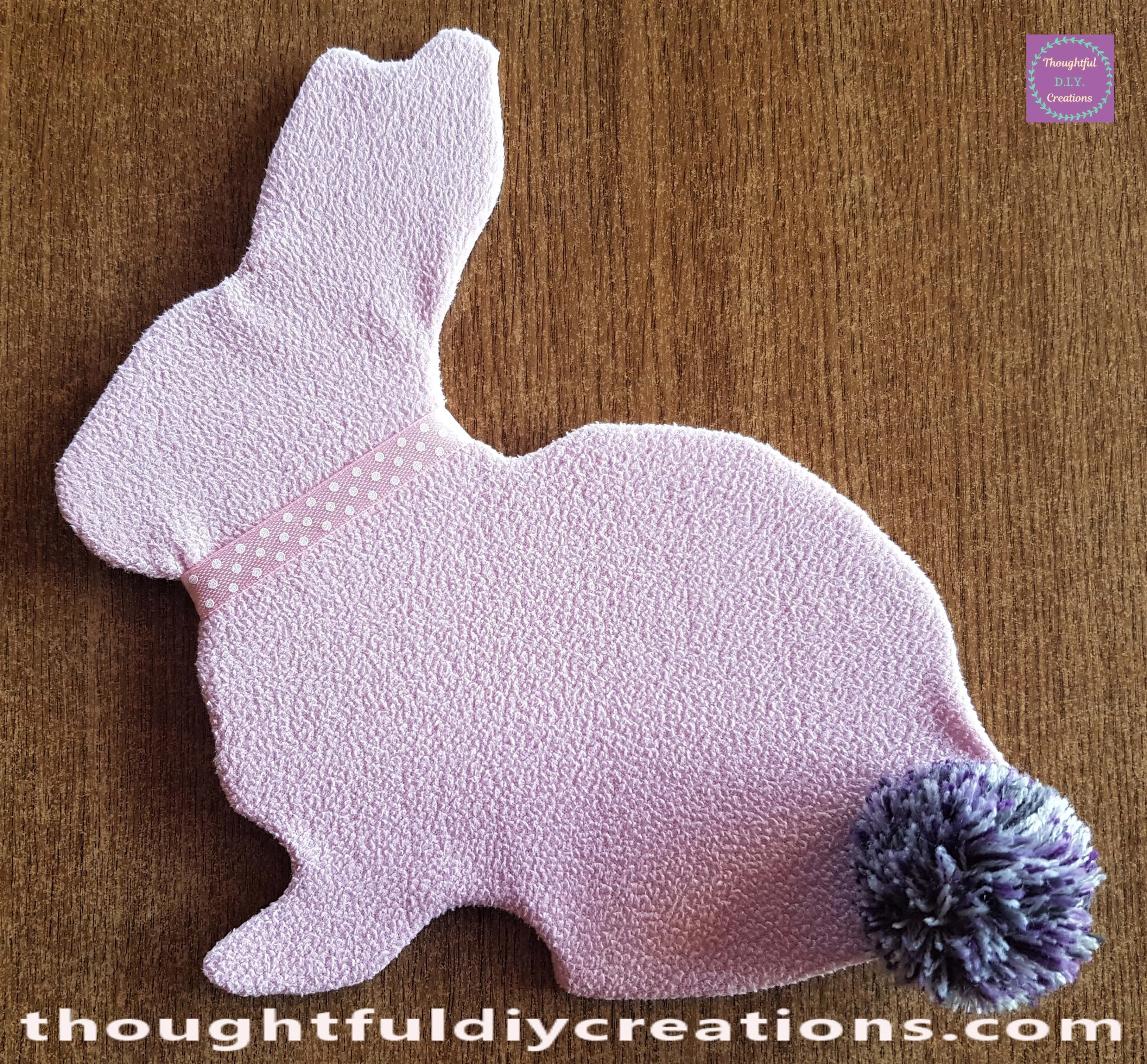 I put Hot Glue on the back of the Rabbit's neck and attached the Ribbon to the Glue.