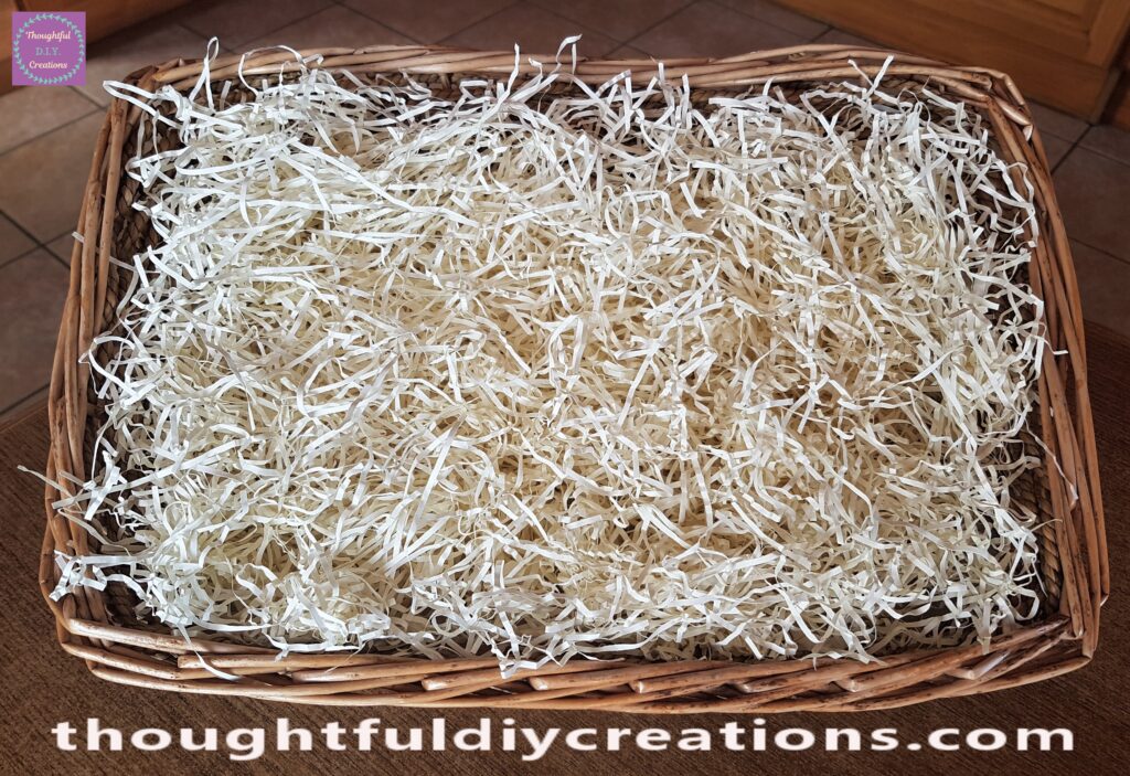 I spread the Raffia around evenly; filling the Easter Hamper.