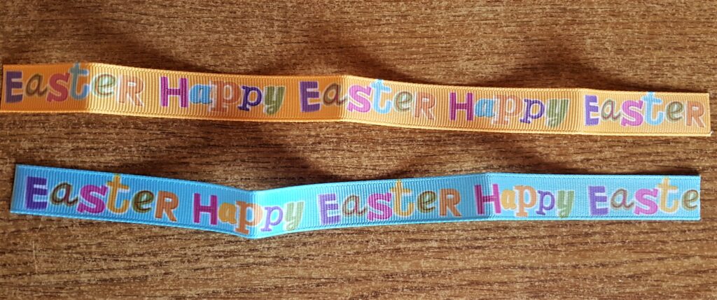 I Cut Off a Section of the Orange and Blue Ribbons.