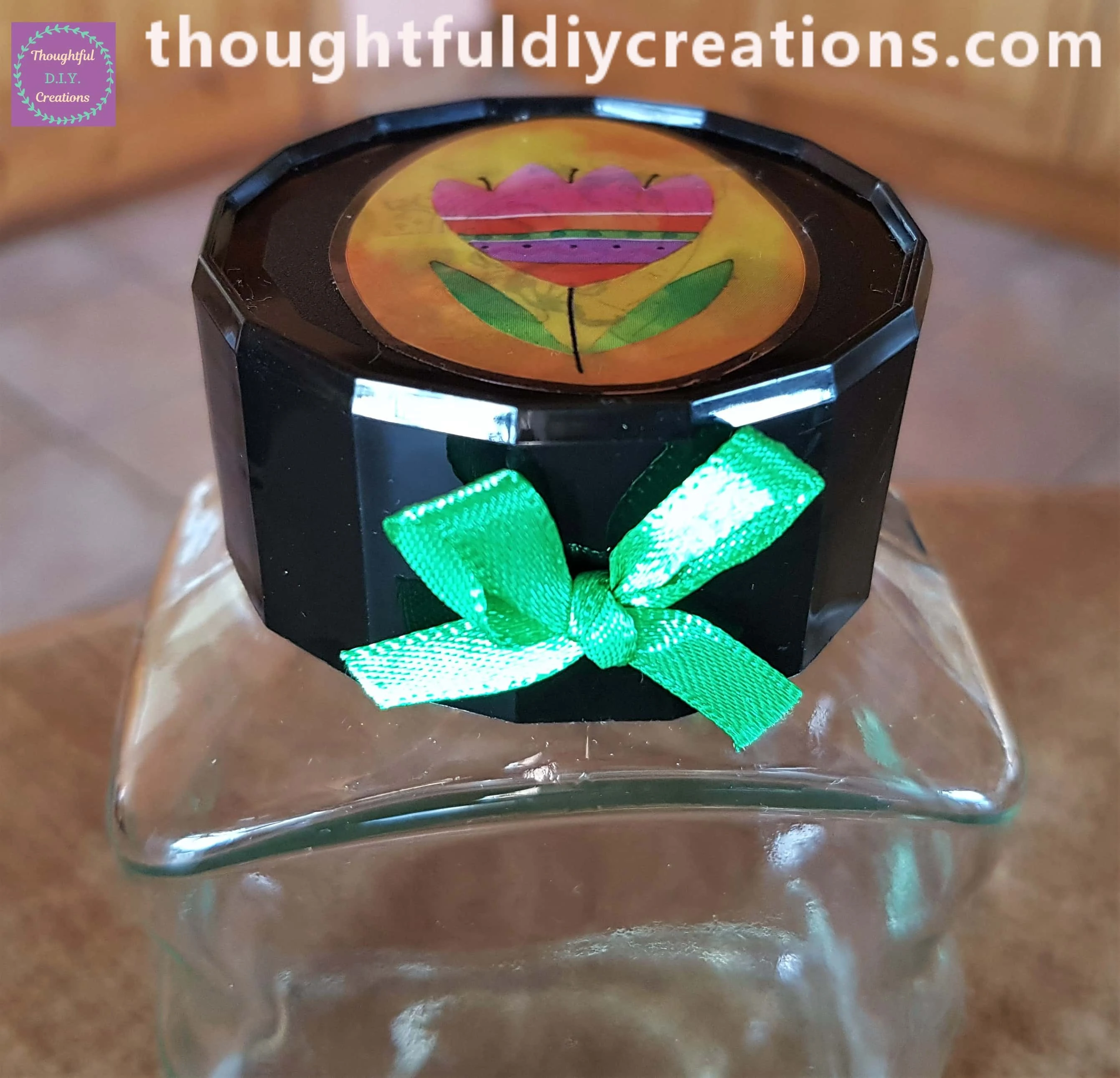 A Sticker of an Easter Egg on the Lid to cover the Logo and attached a Green Bow on the Lid with Hot Glue.