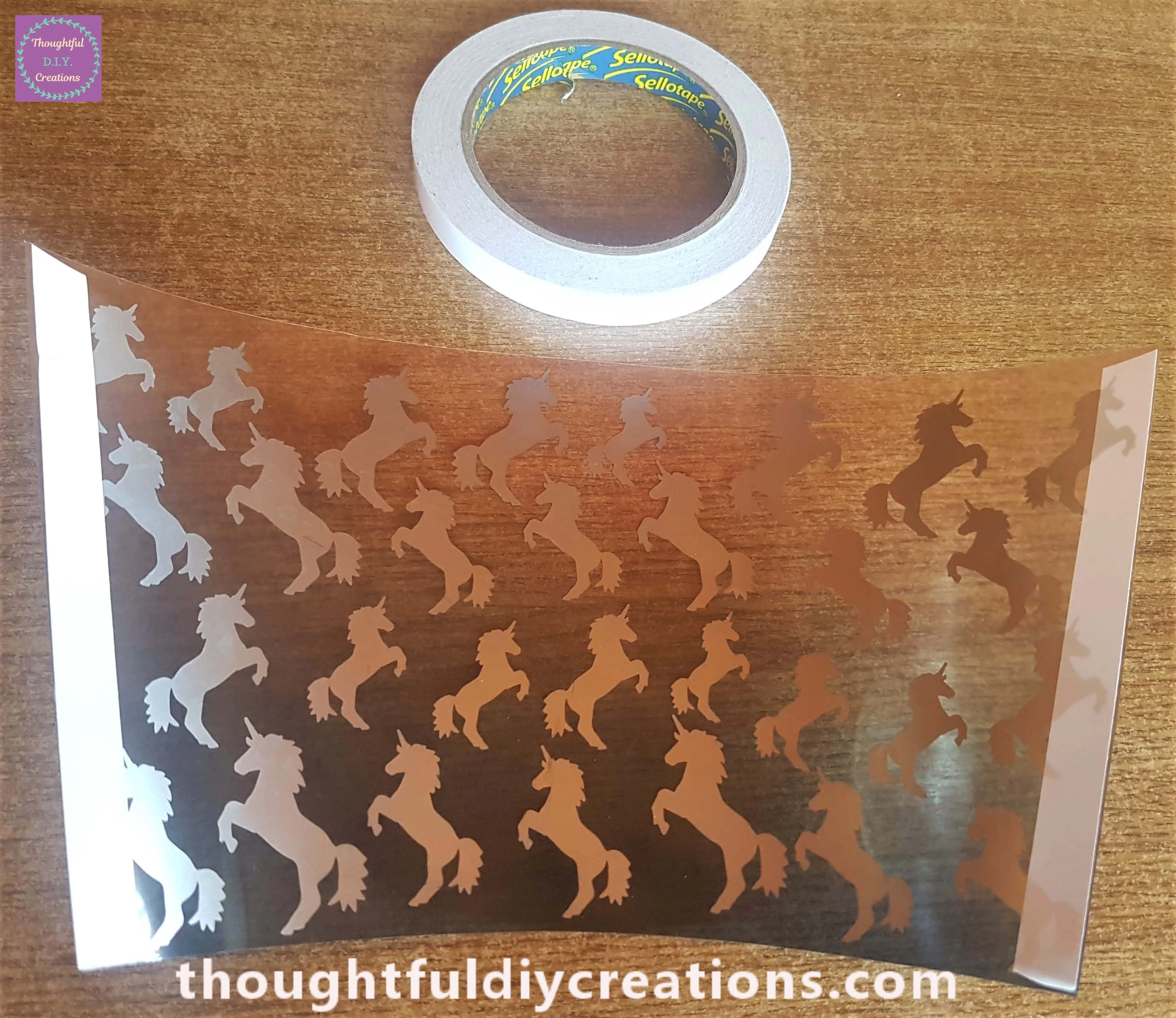 I put a strip of Double-Sided Tape on the 2 ends on the back of the Unicorn Sheet.