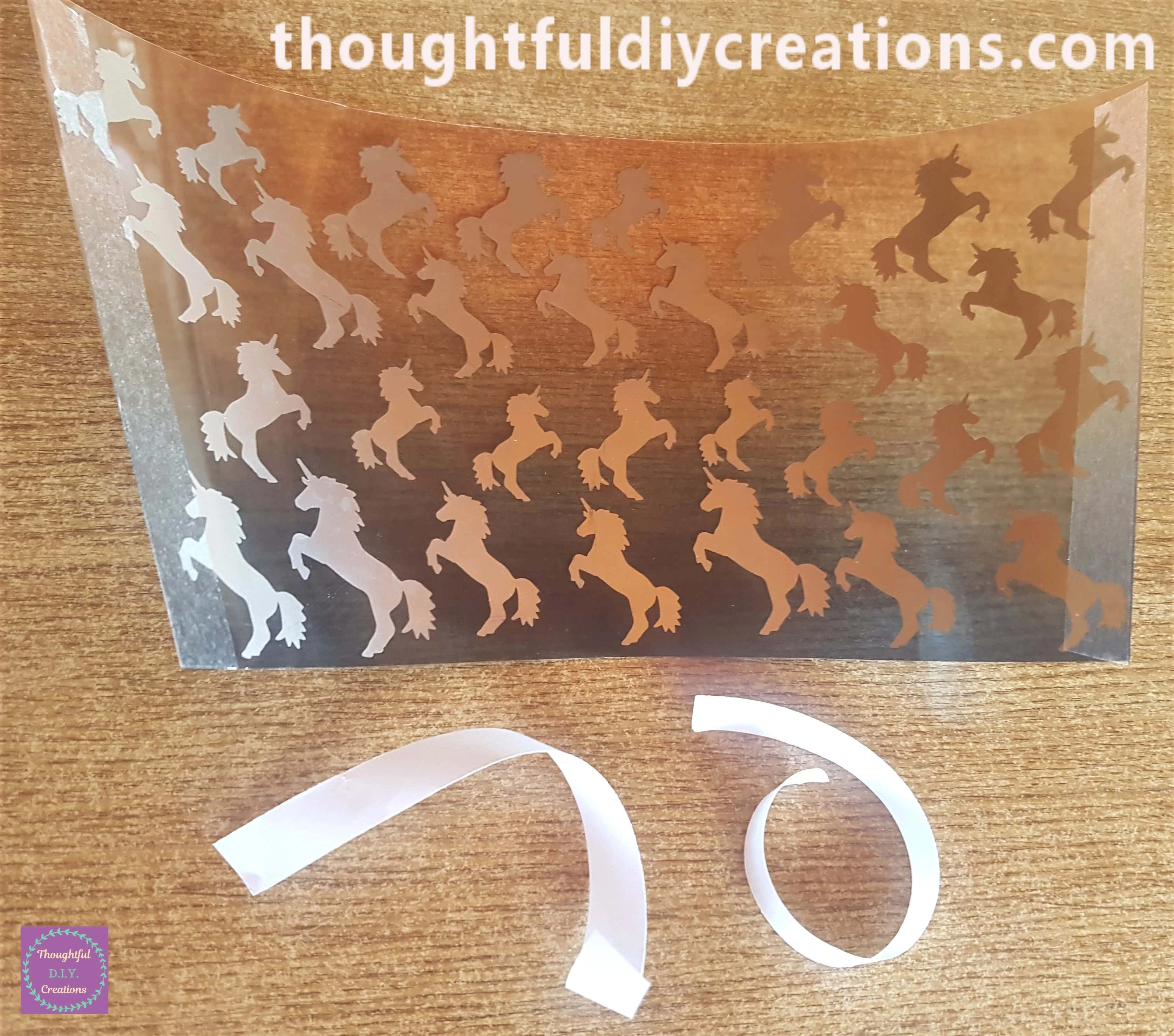 I removed the White Plastic Backing from the Double-Sided Tape.