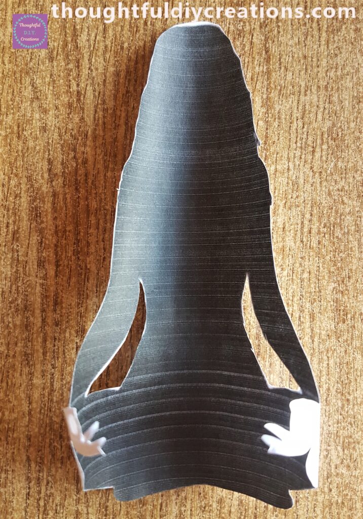 I Cut out the Woman Meditating with a small, sharp Scissors.