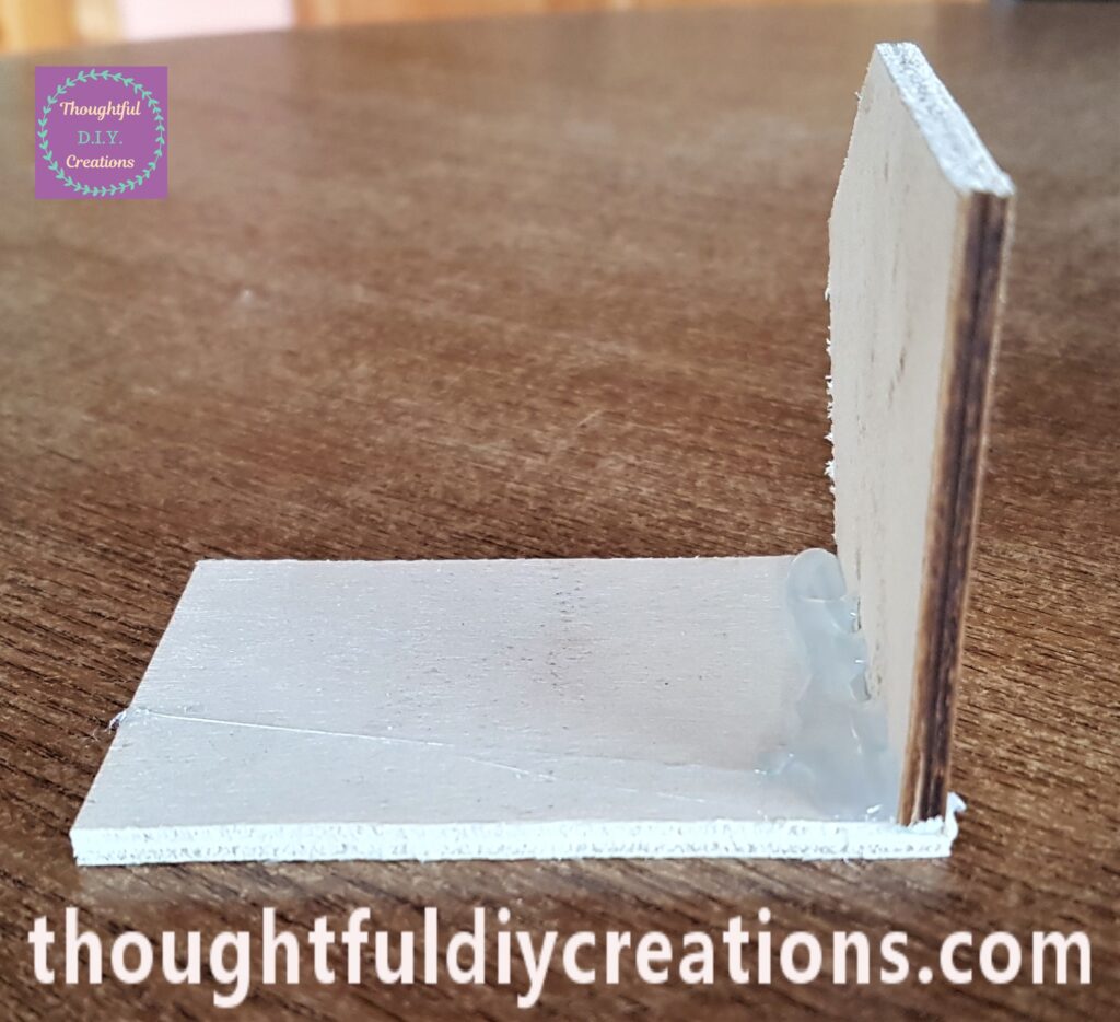 I Hot Glued one Side of the Fairy Cottage to the Back of the Fairy Cottage.