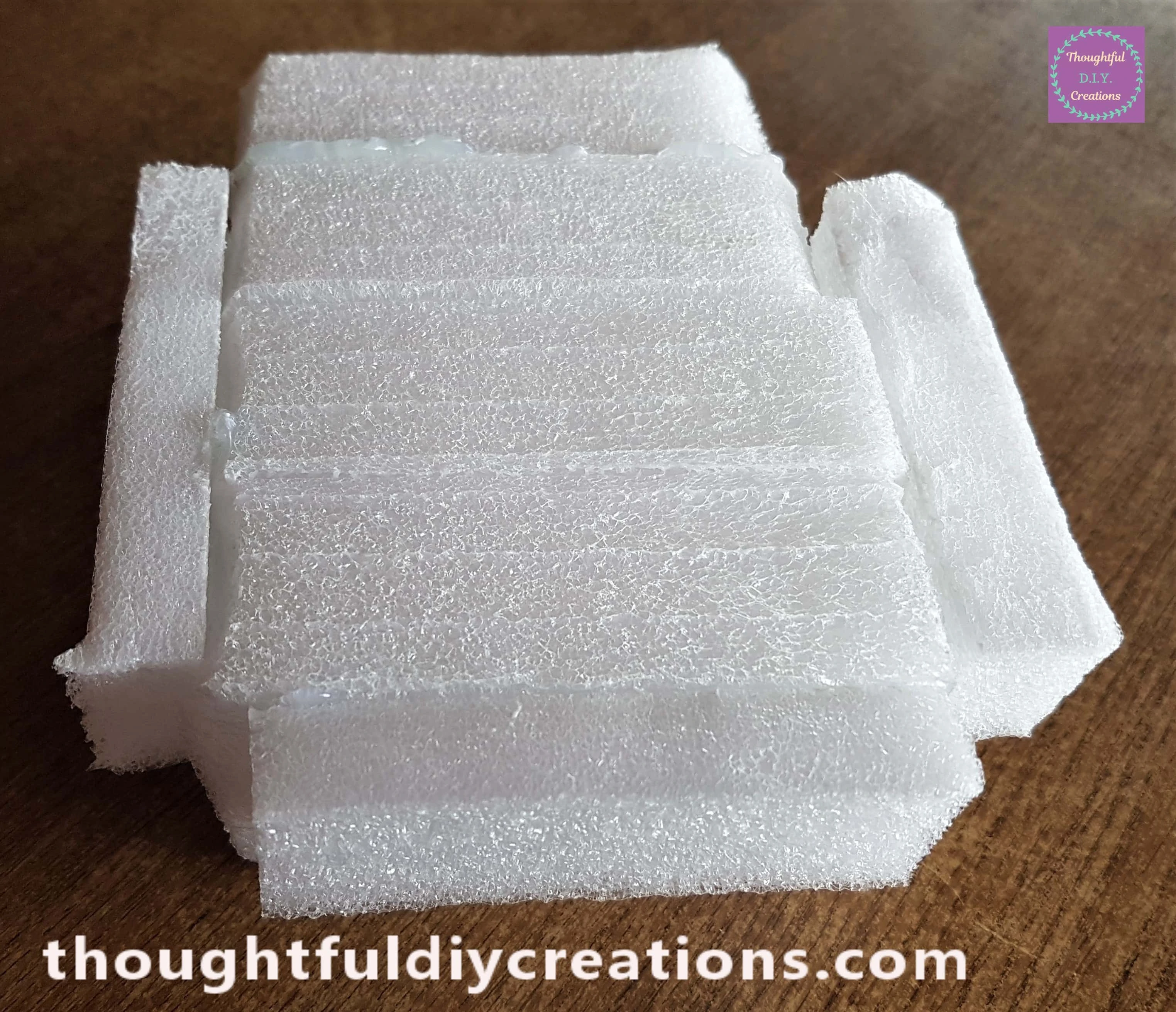 I attached each foam piece to the top sides of the bigger foam piece.