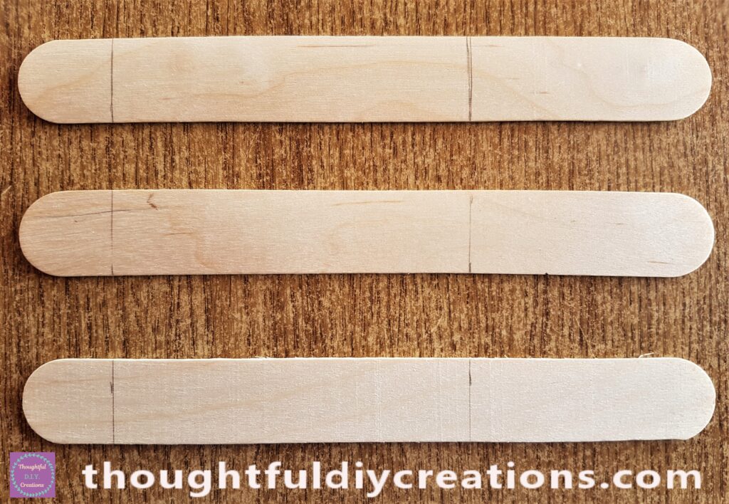 I marked the measurements on each of the sticks the same width as the foam in the fairy garden.