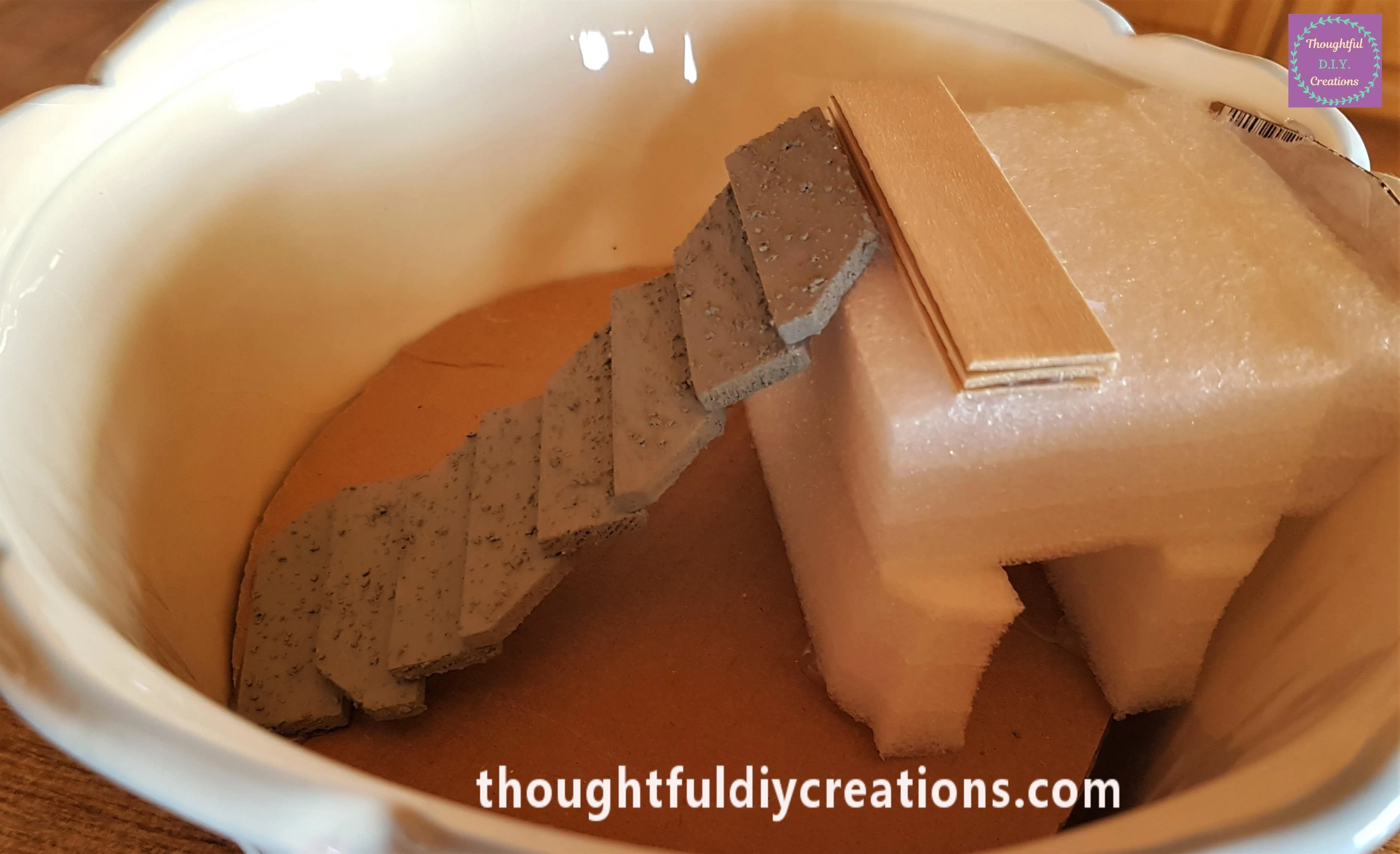 I Hot glued them one-by-one to the foam; they were now the same height as the steps.