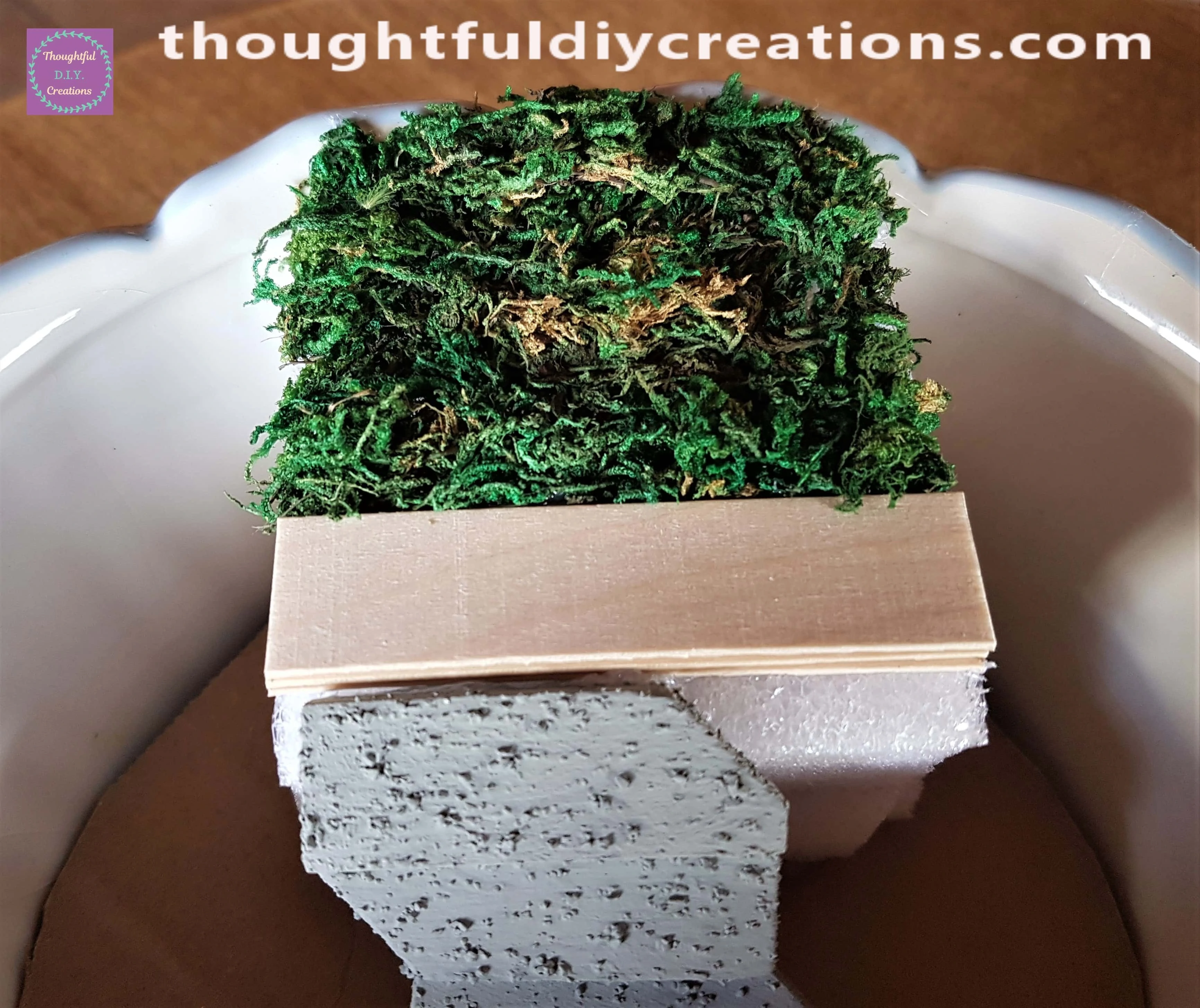 I Hot Glued small sections at a time to the top of the foam.