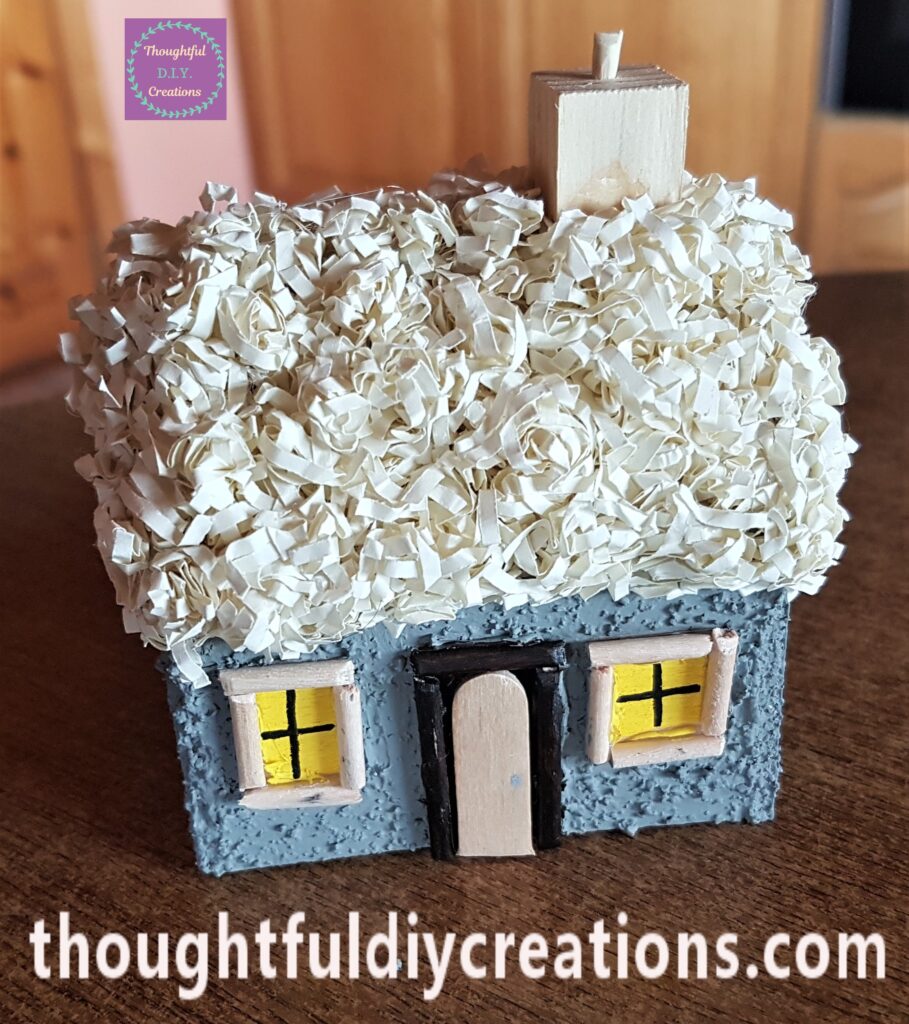 The pointed end fit perfectly into the hole in the cube. My Chimney was now complete.