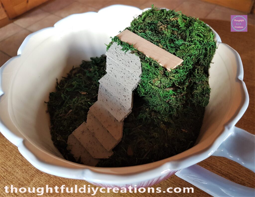 Finally I added Moss all over the Cardboard and filling in any gaps in the Teacup.