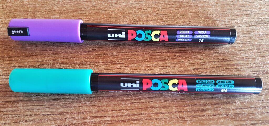 I got my Violet and Metallic Green Acrylic Paint Pens.