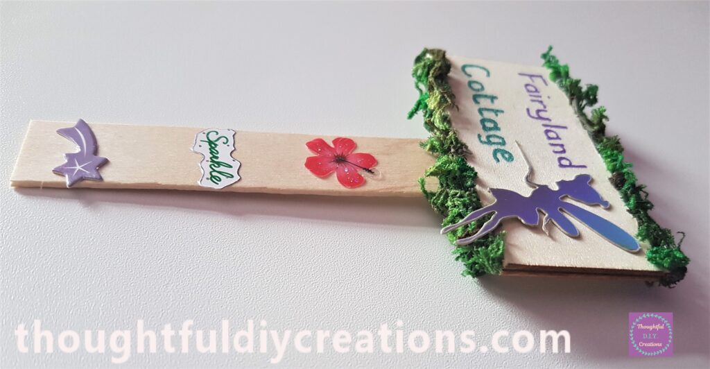 I added a Fairy Silhouette to the Sign and Stickers to the Sign-Post.