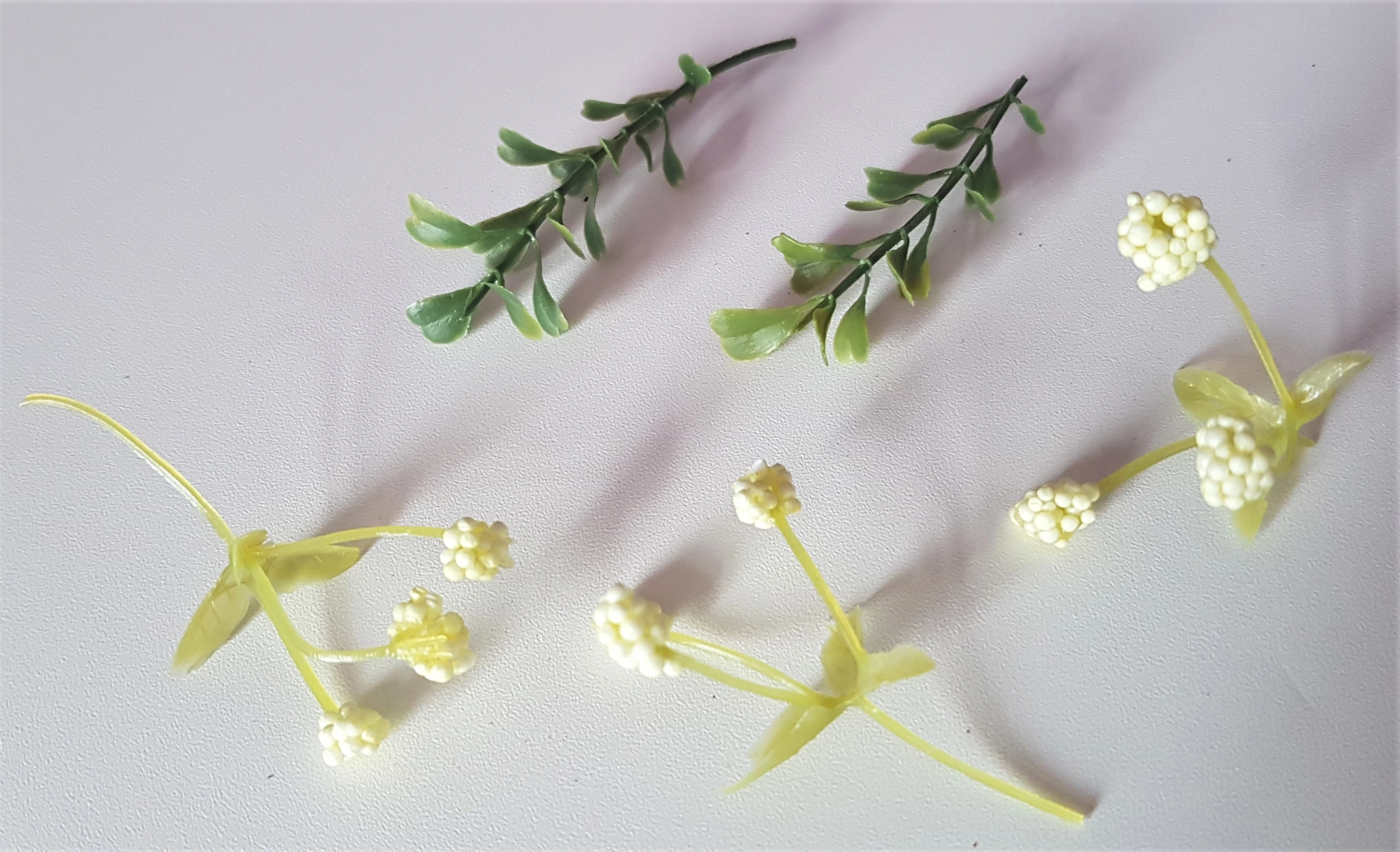 I cut off some Leaves from some Artificial Flowers.