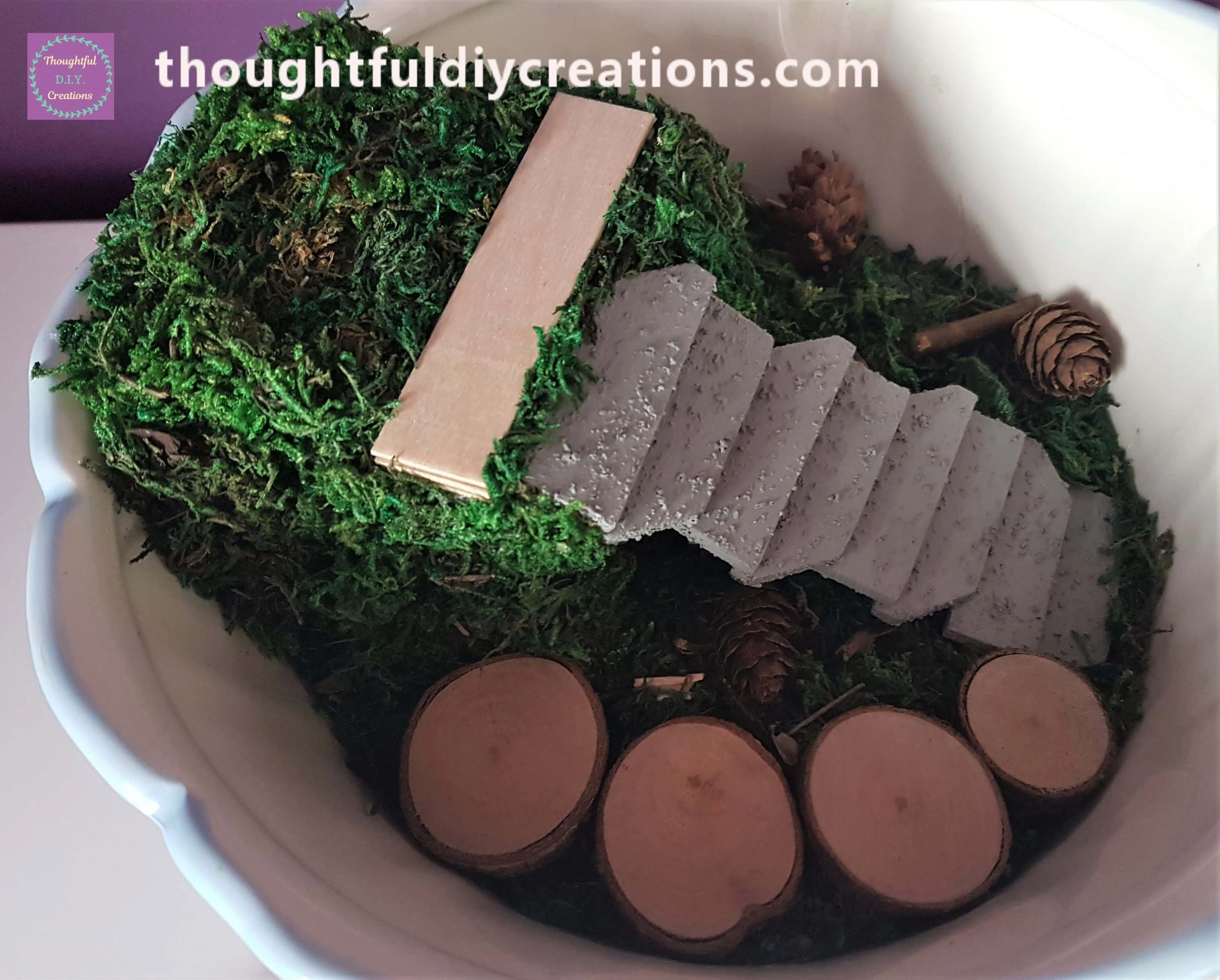 I scattered a few mini pine cones randomly in the Garden.