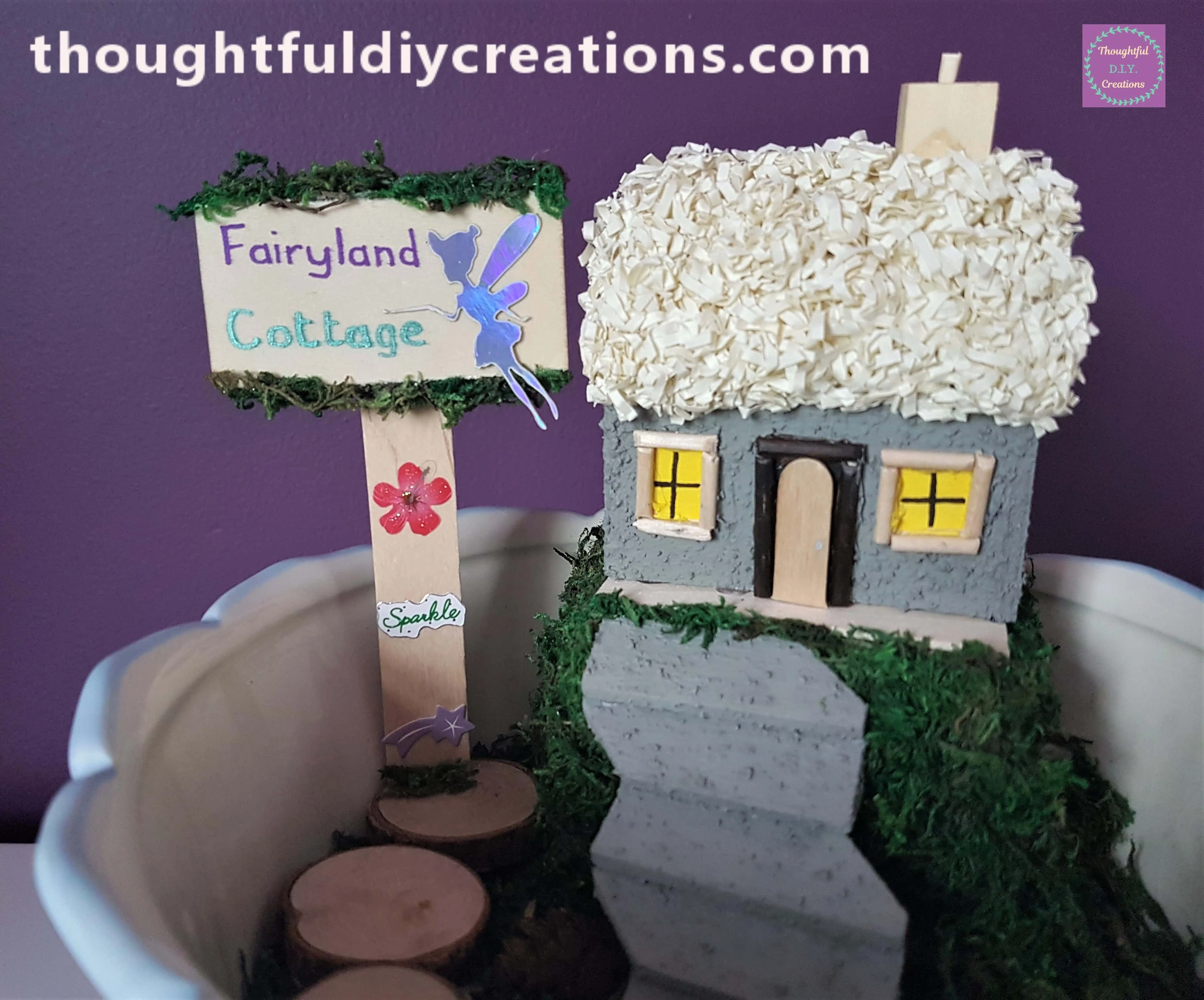 I Hot Glued the Fairy Cottage to the Top of the Hill and placed the Sign beside the Cottage.