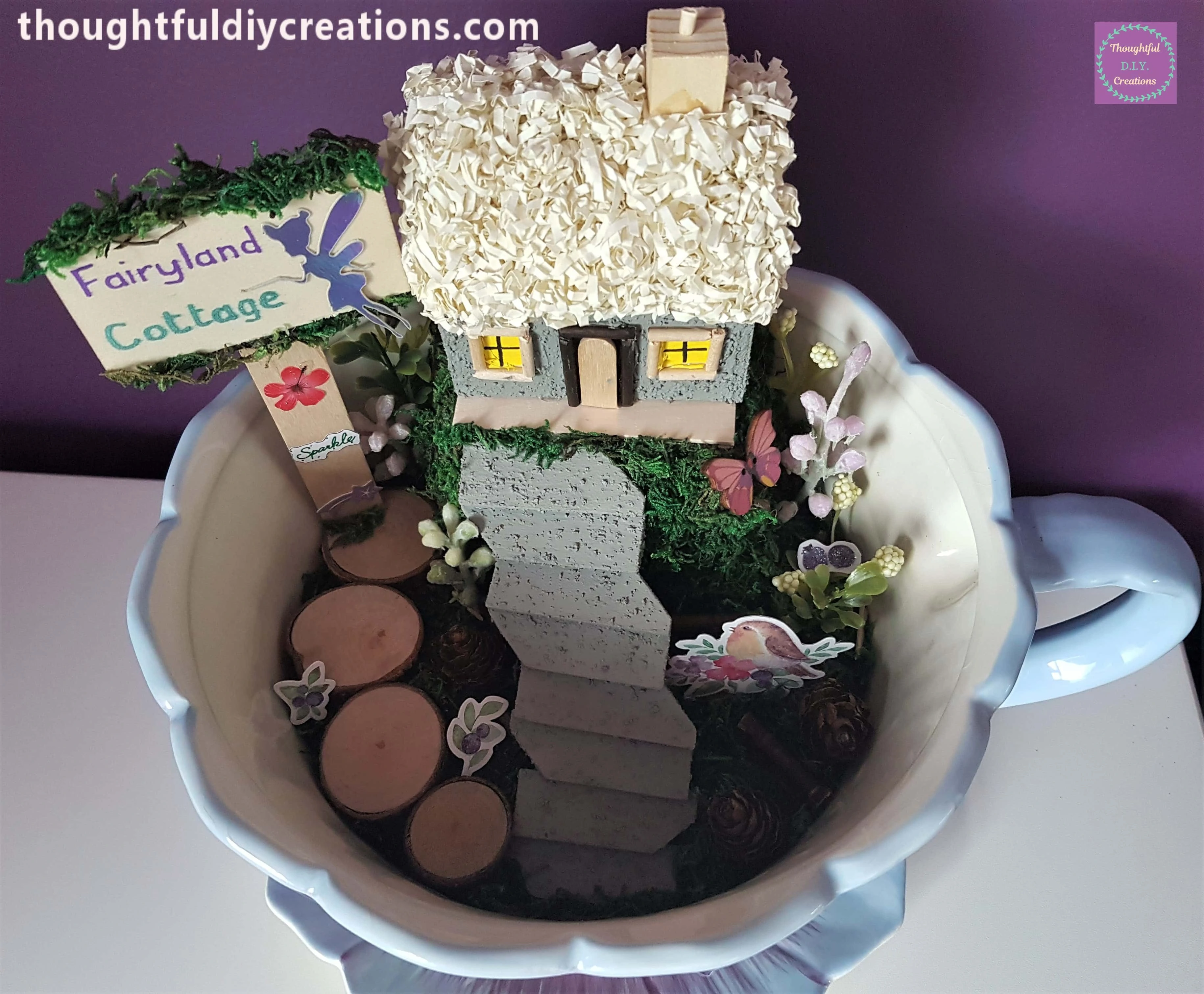 I put a dab of Hot Glue on the end of everything and poked them through the Moss. I placed the berries randomly in the garden.