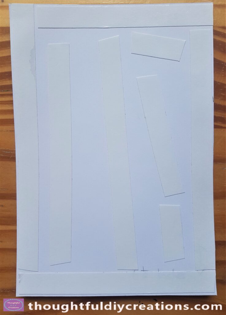 I got my Roll of Double-Sided Tape and Cut and Stuck down various pieces to the back of the Sheet.