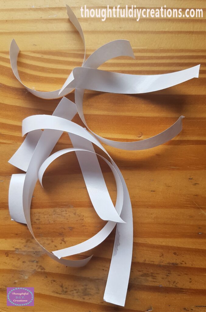 I removed the White Backing of each piece of the Double Sided Tape.