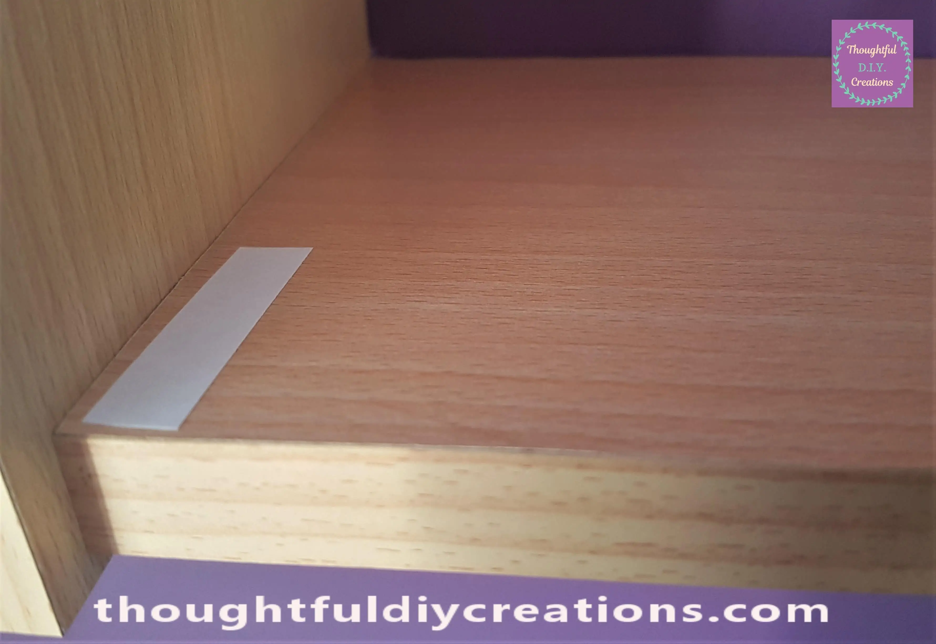 I Cut a section of Double-Sided Tape and pressed it to the Inside of my Shelf.