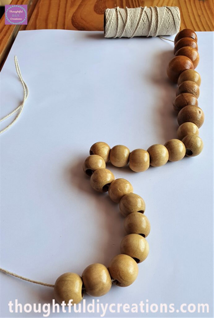 The 16 small Wooden Beads were included to the Garland.