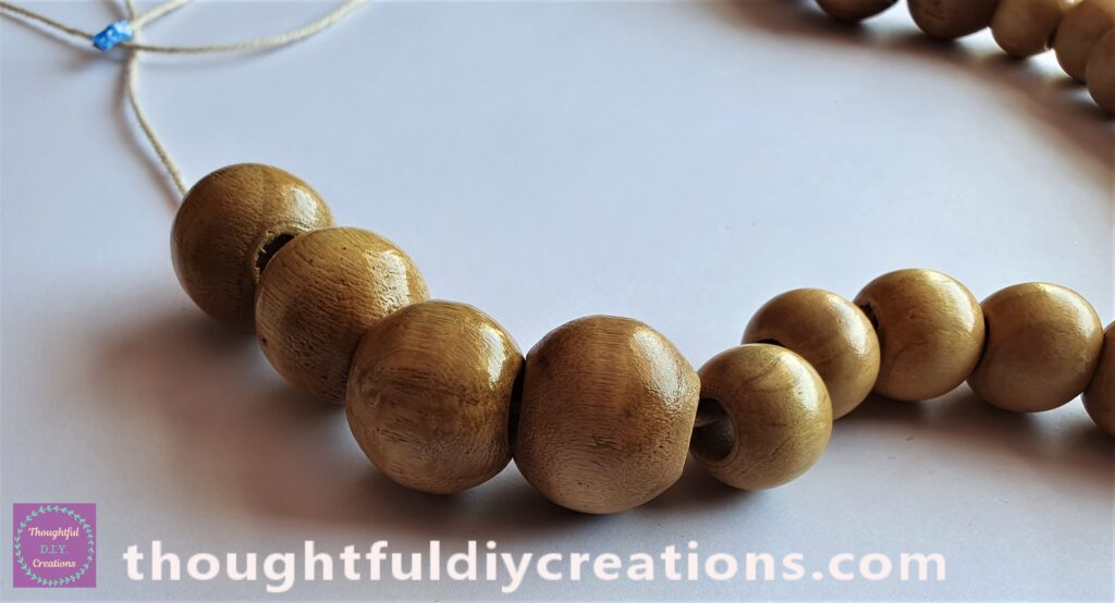 The remaining 4 Medium Beads were added next to the String.