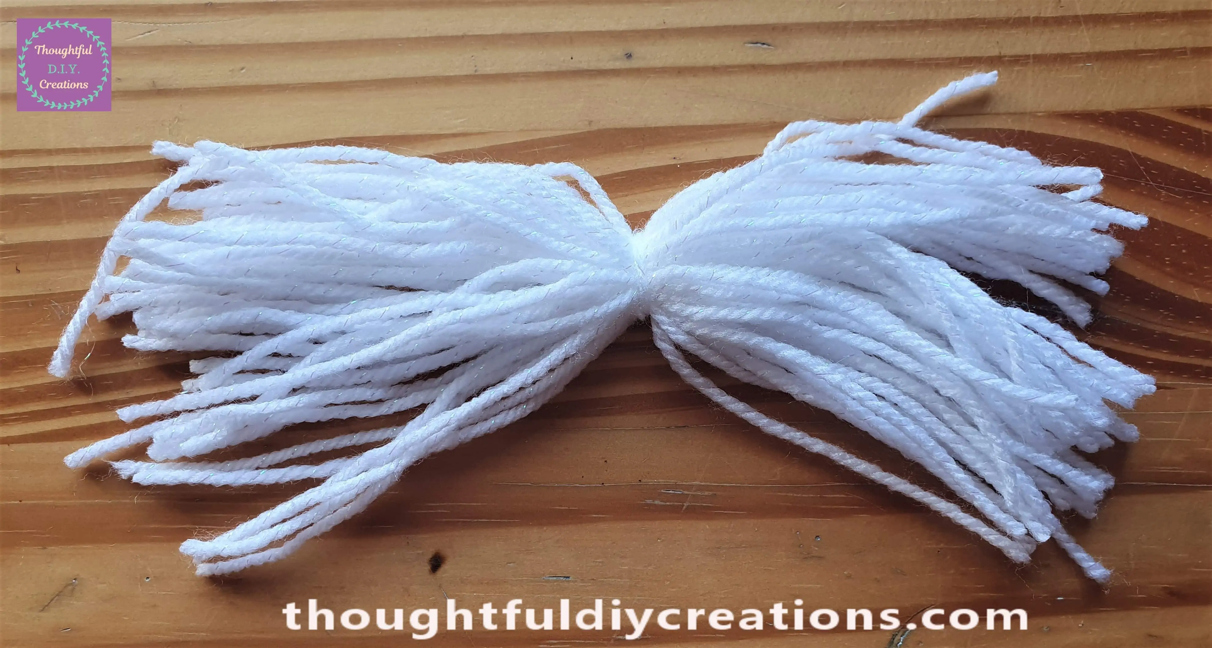 I Cut across the bottom line of wool.