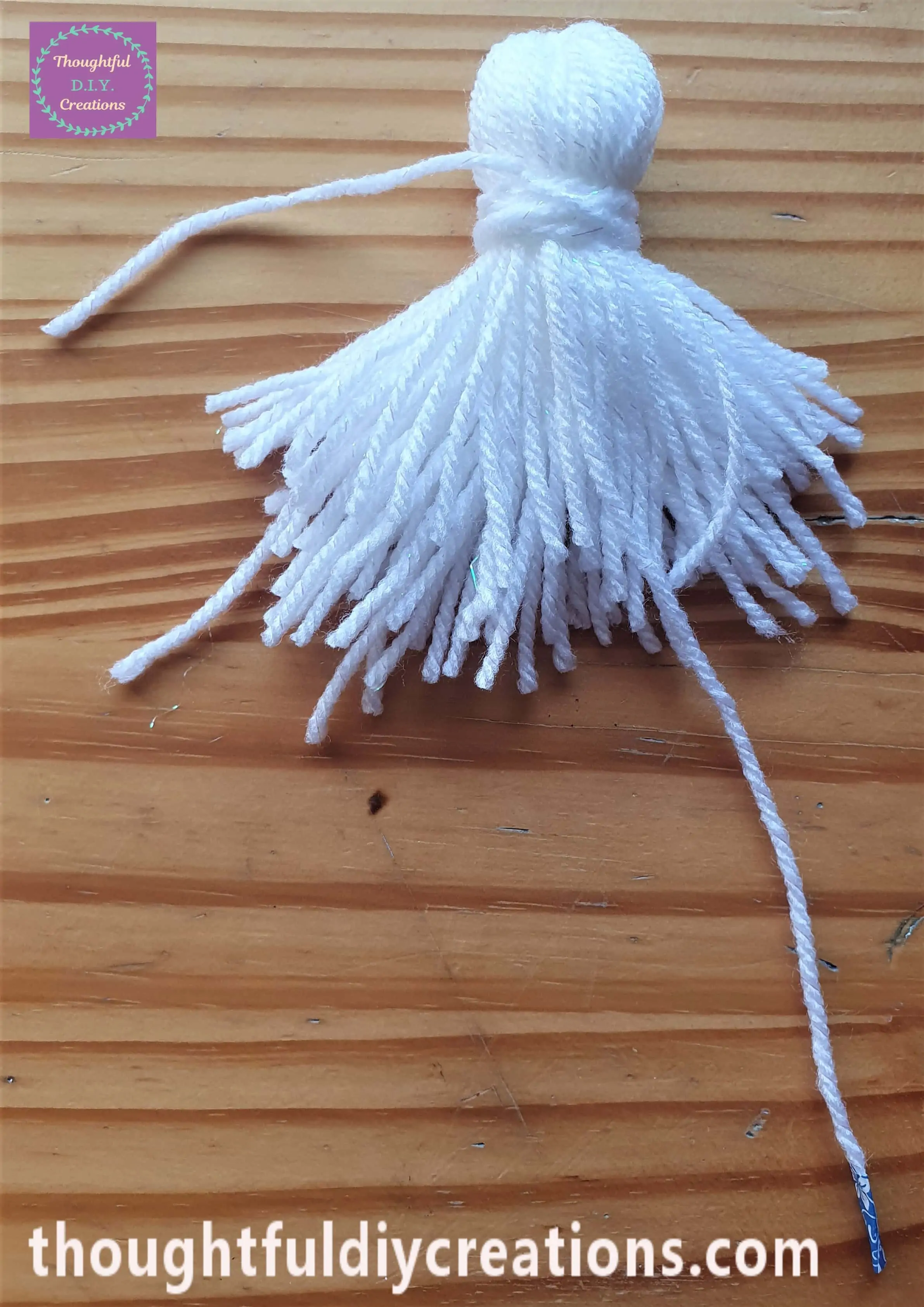 A Full View of how it looked after I pulled the string and the knot formed through the loop.