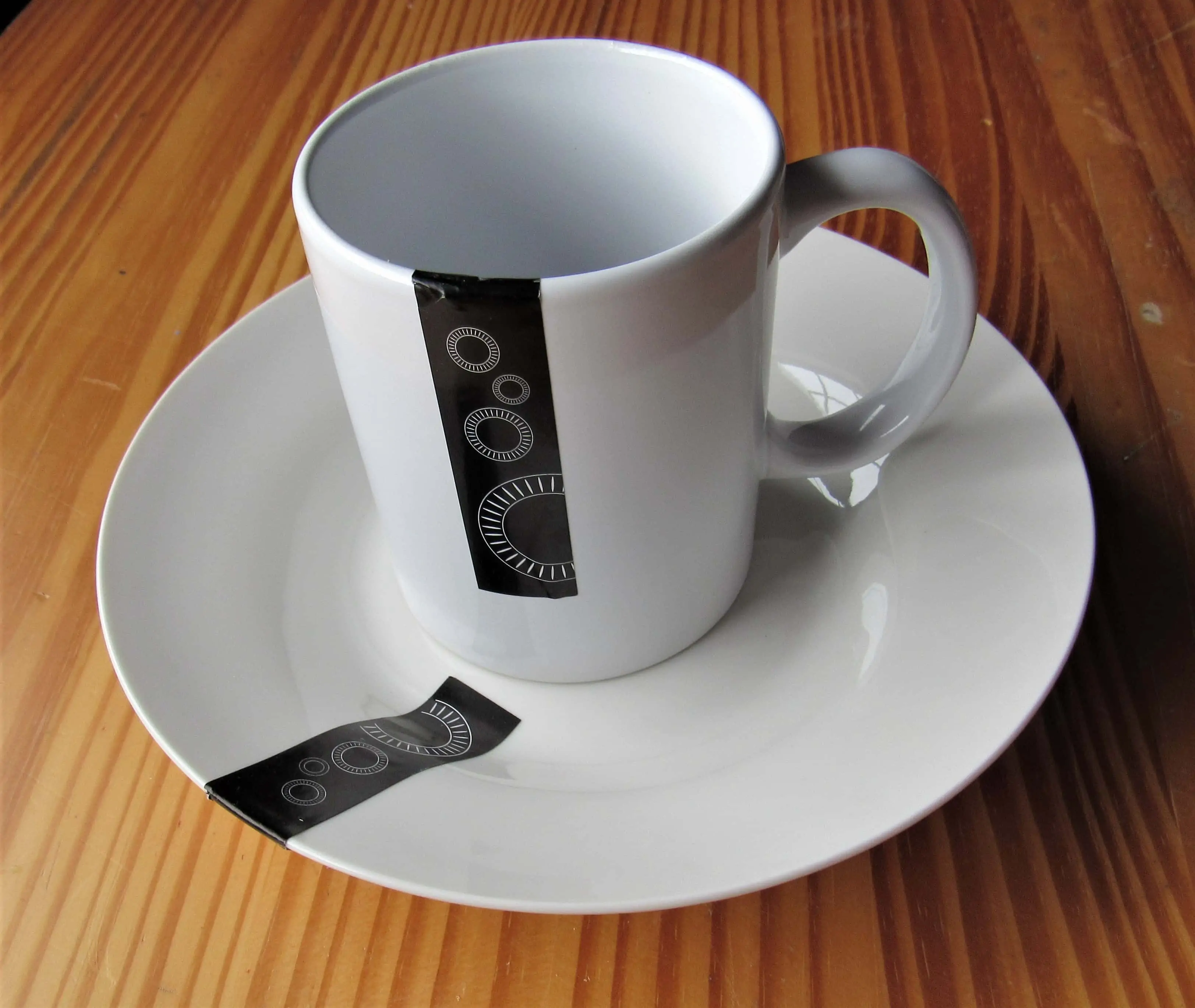 I bought a White Cup and Plate in my local EuroGiant Store.