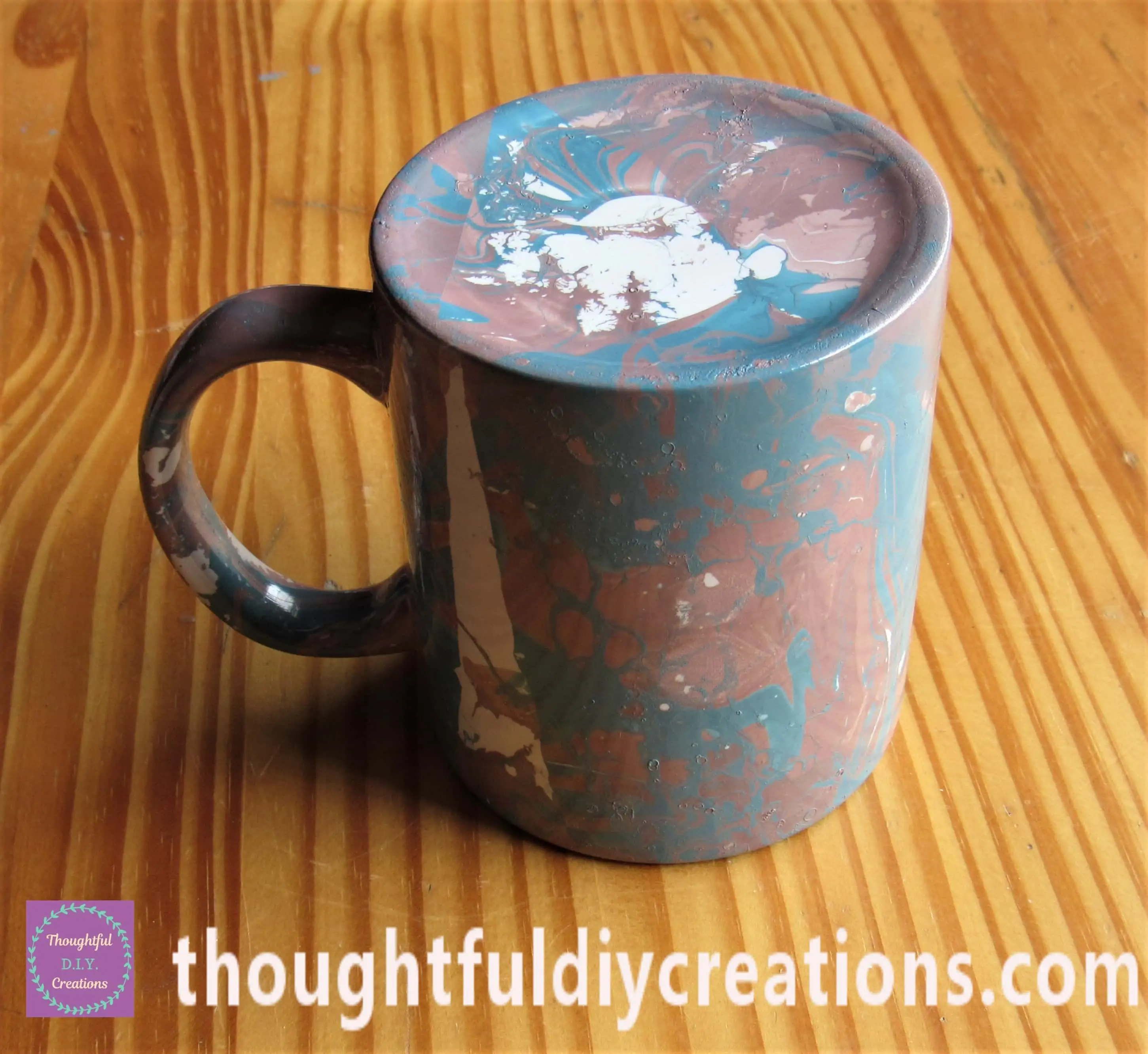 This is the Result of the Cup after all the Marbling attempts and drying time of a few hours.