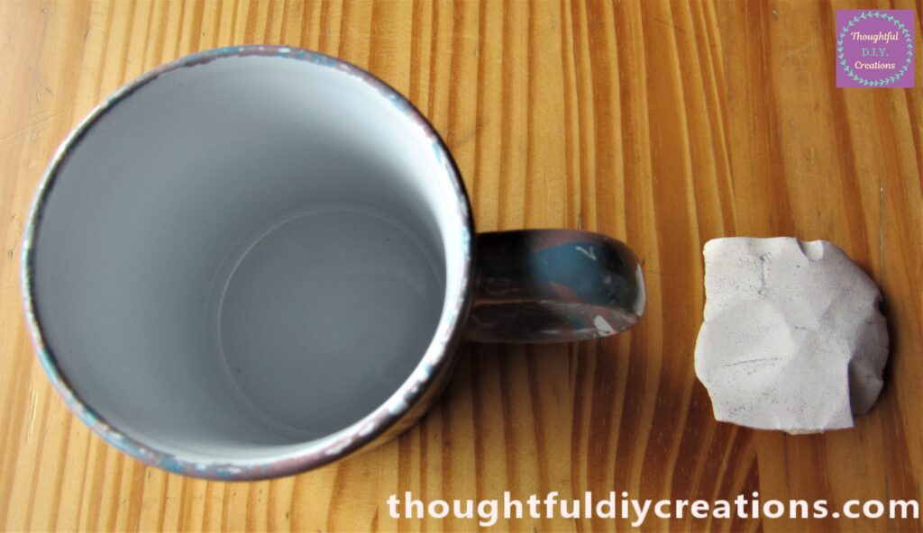 I tore a piece of Fine Sandpaper and Sanded off the Marbled Splatters from the Inside of the Cup.