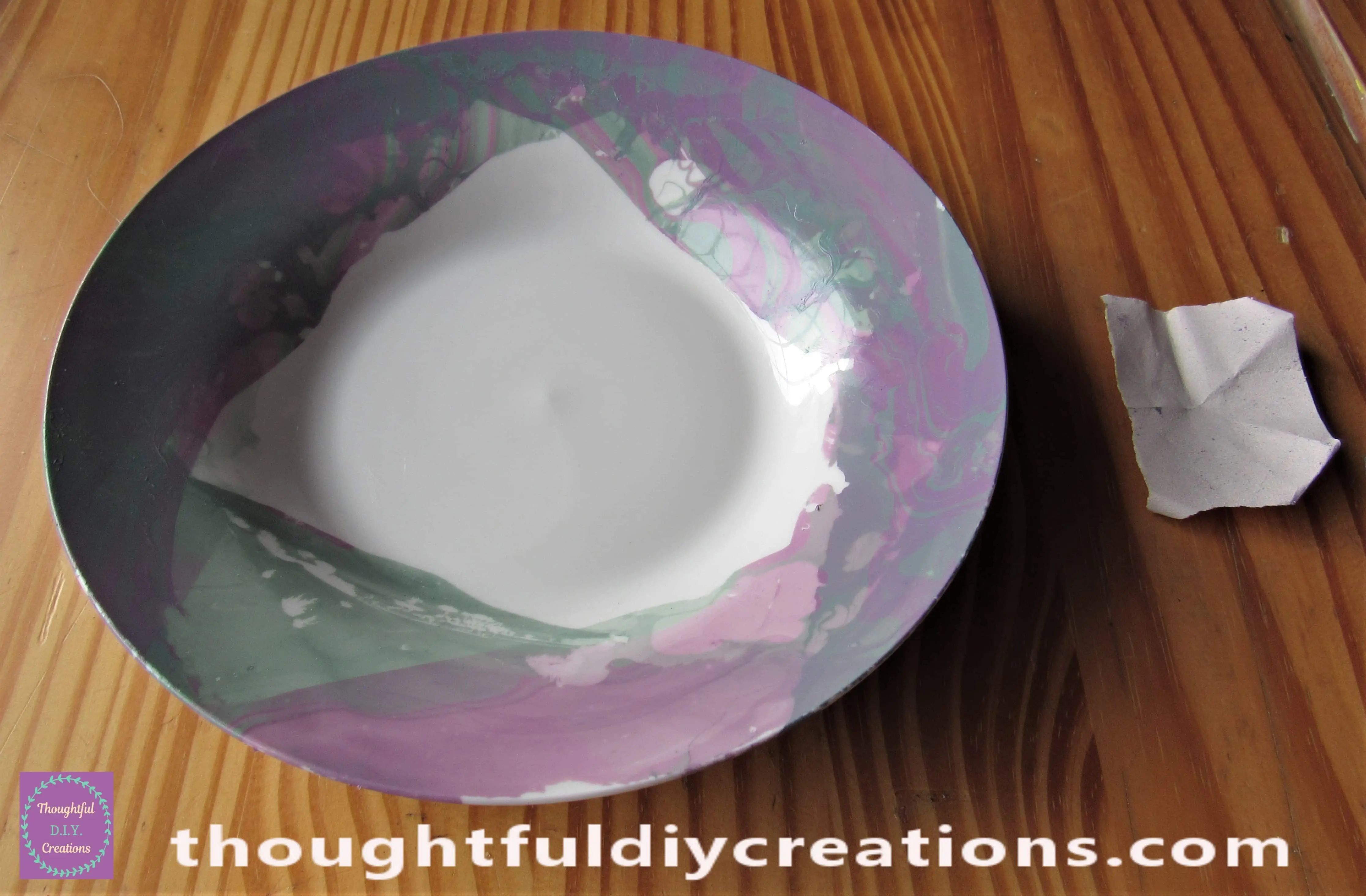 Another piece of Sandpaper was used to Sand away any excess Splatters in the Center of the Plate.