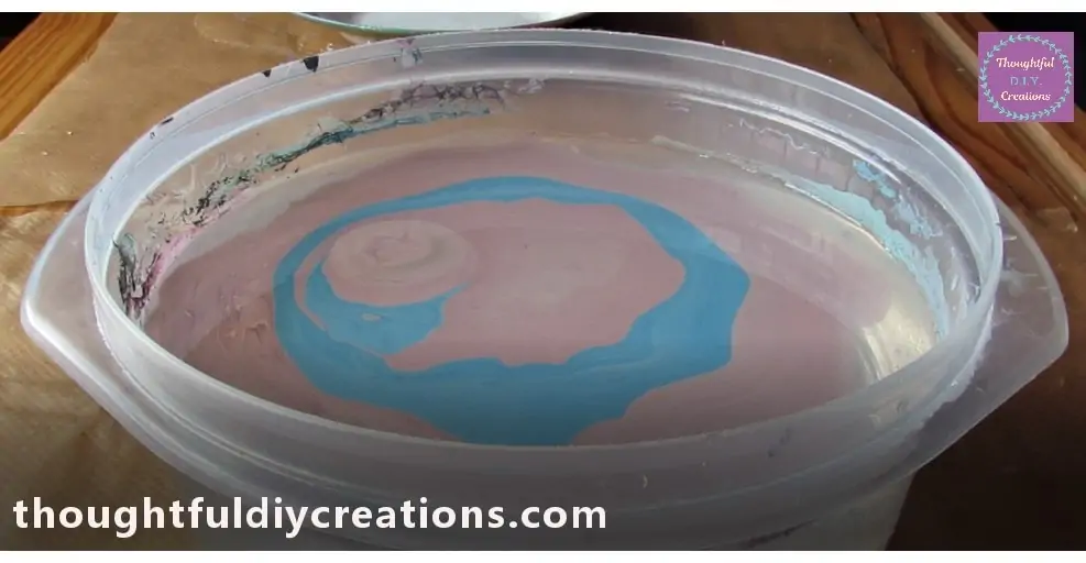 The Marbled Colours in the Bowl of Water.