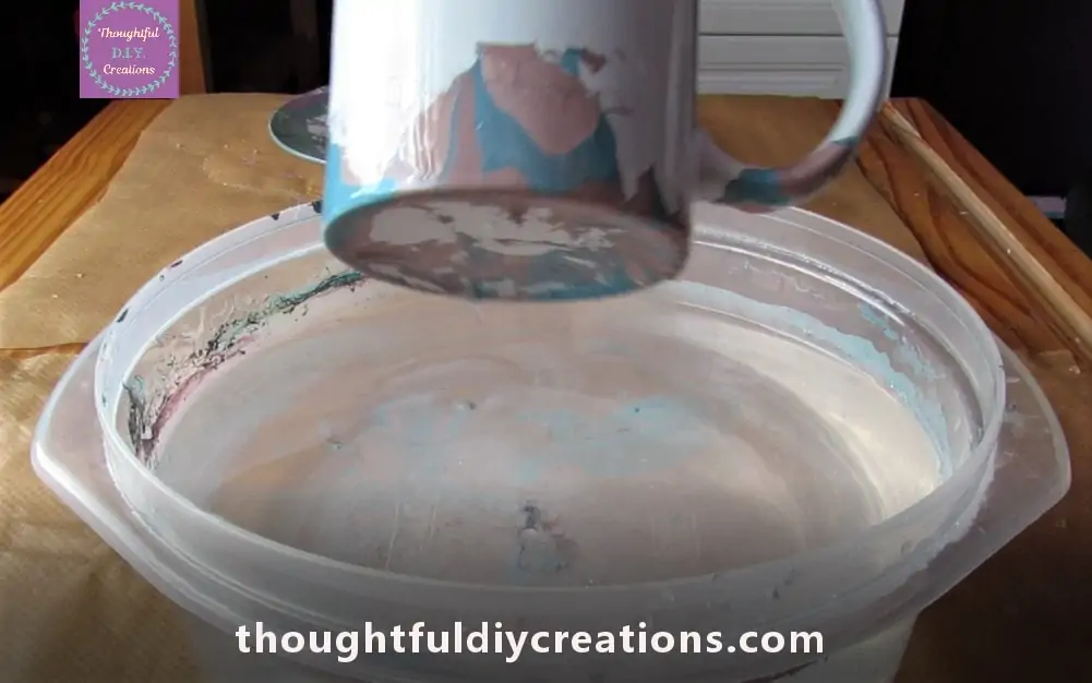 The Bottom of the Cup being removed from the Water.