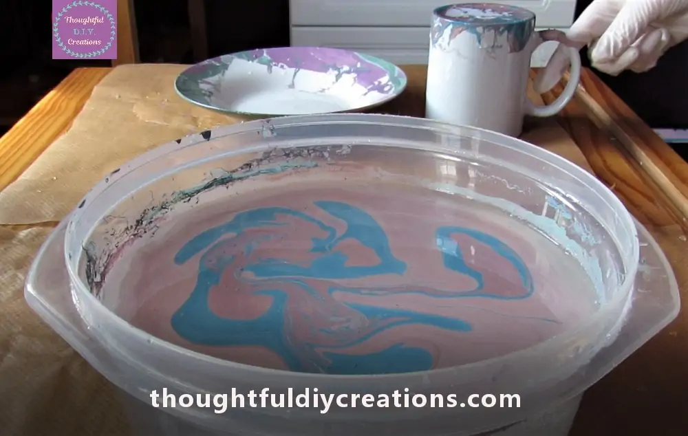 I repeated the process of adding the Colours to the Bowl and mixing them with a new skewer to form a design.