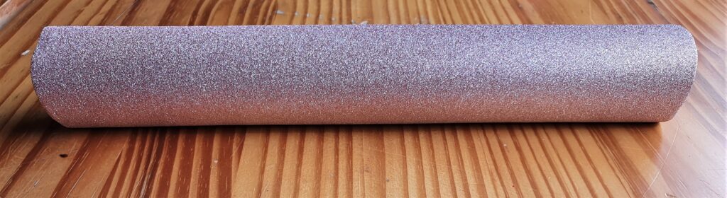 Roll of Self-Adhesive Glitter Paper.