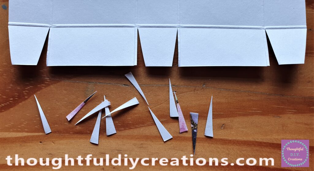 I Cut a Straight Line at the Edge of the Square and then Cut at an Angle into the Edge. I Cut a Slight Angle into the Outer Edge Squares.