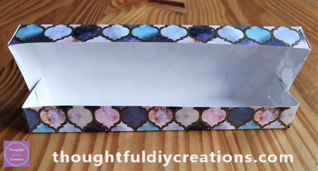 I attached the final 2 squares to the other side of the inside rectangles on the bottom of the Gift Box.