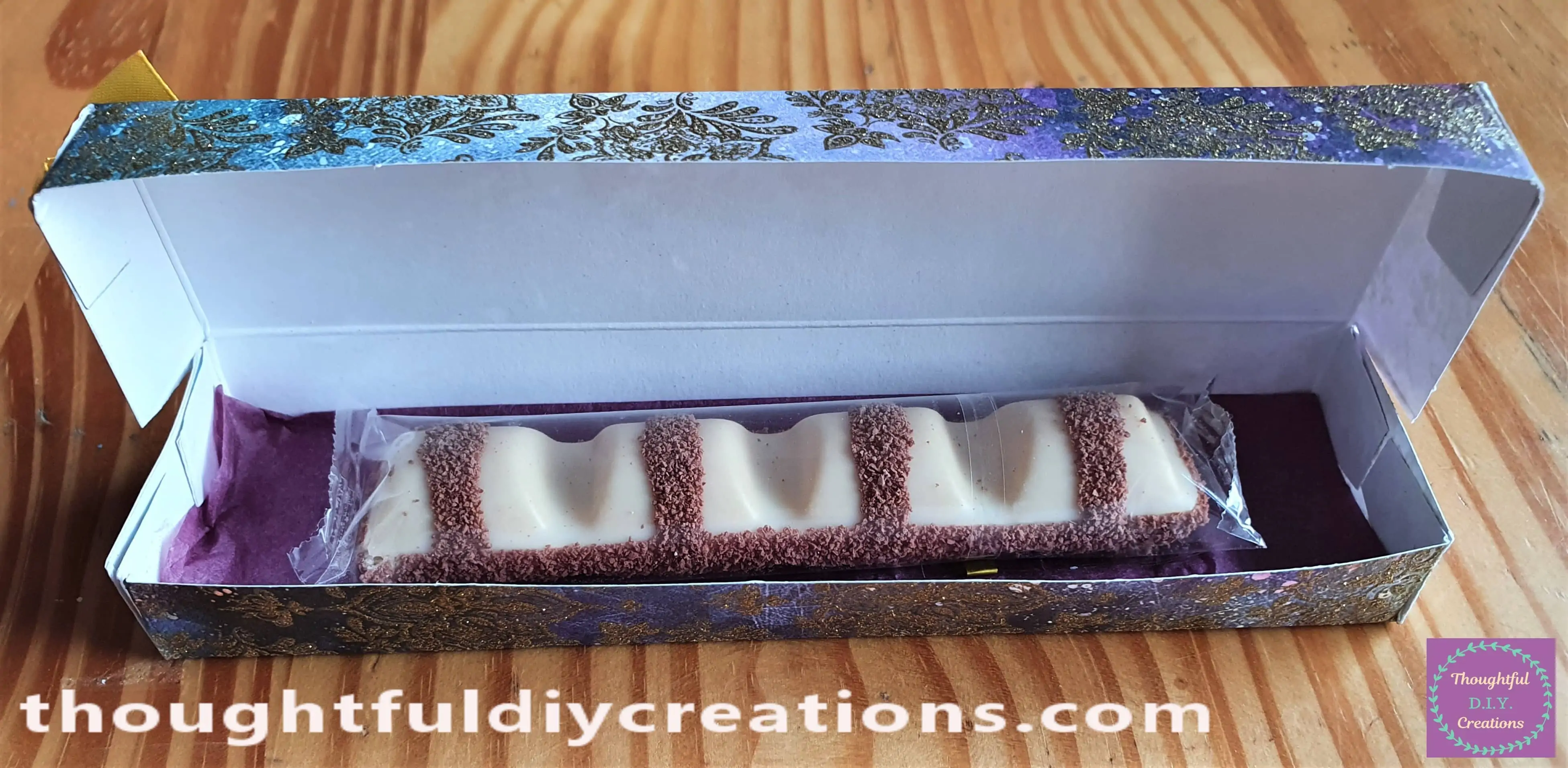 I put a Sheet of Tissue Paper and half of a White Kinder Bueno into one of the Gift Boxes.