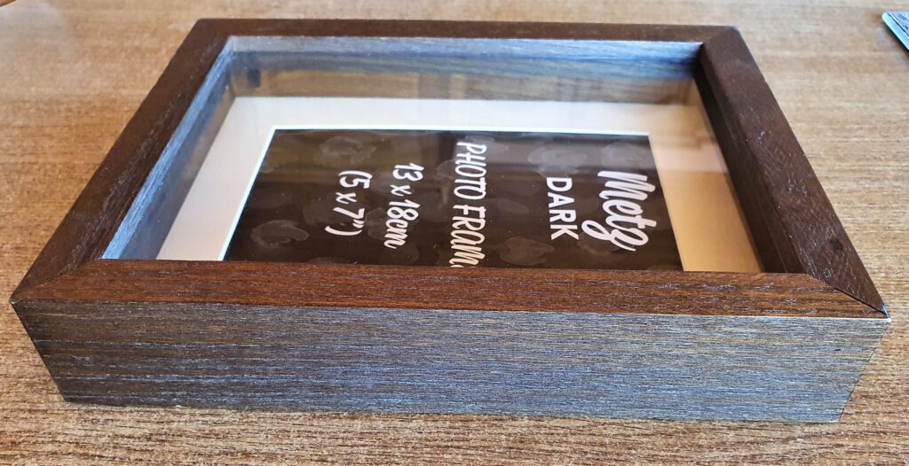I bought a gorgeous Brown Wooden Shadow Box Frame which measures 8" x 10".