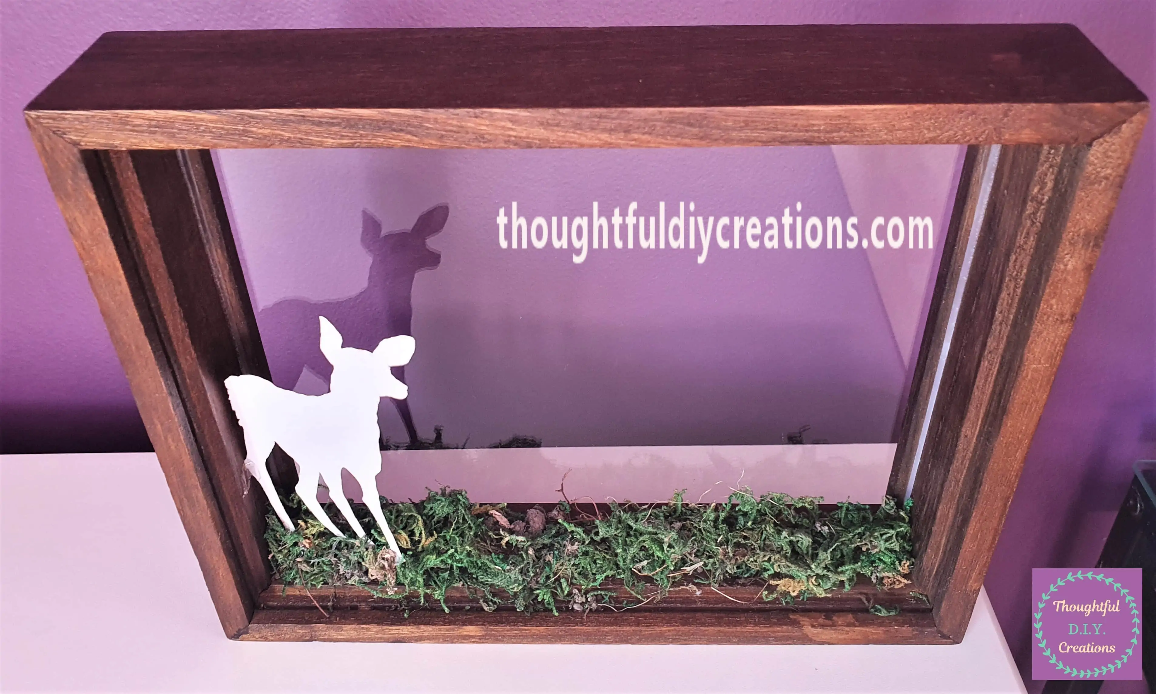 A Full angle of the Frame with the Deer Hot Glued to the Moss.