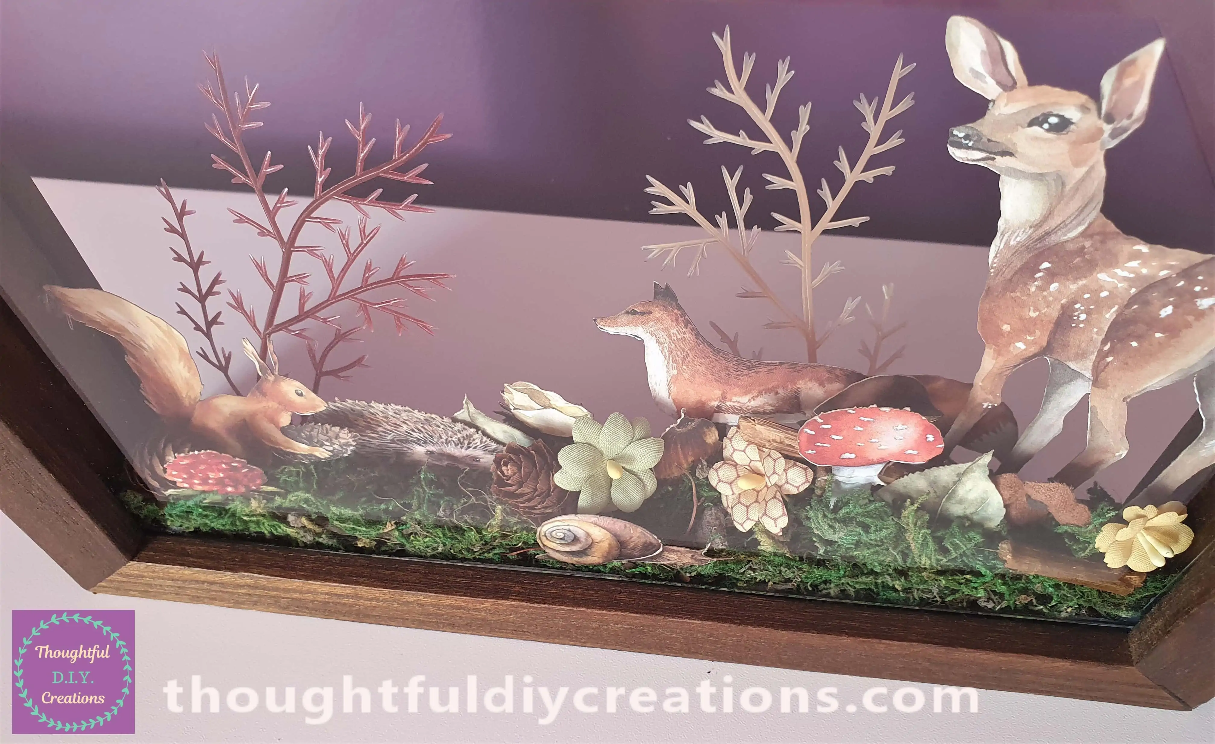 I hot glued a Burgundy Coloured Plastic Tree and a Cream Tree to the Frame.