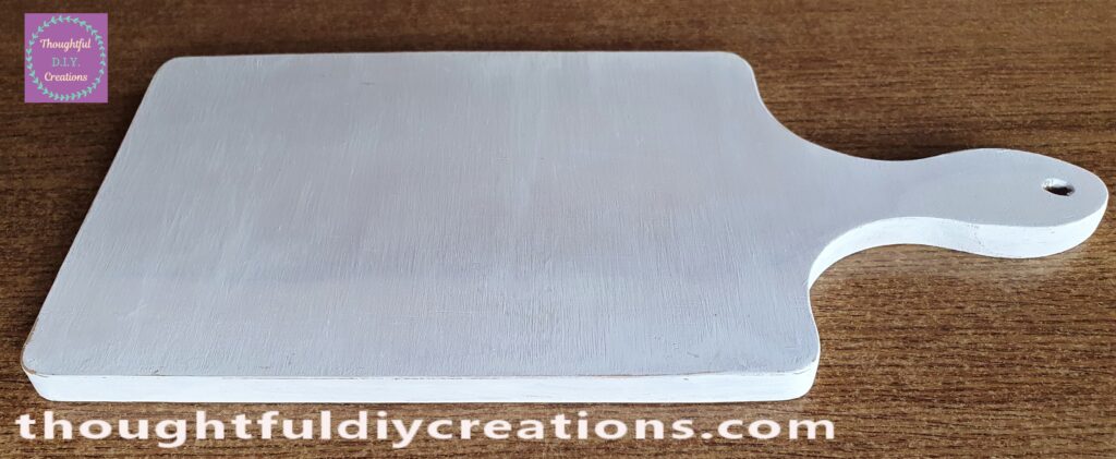 I Painted the Back of the Chopping Board. I then Painted another layer all over the Chopping Board.