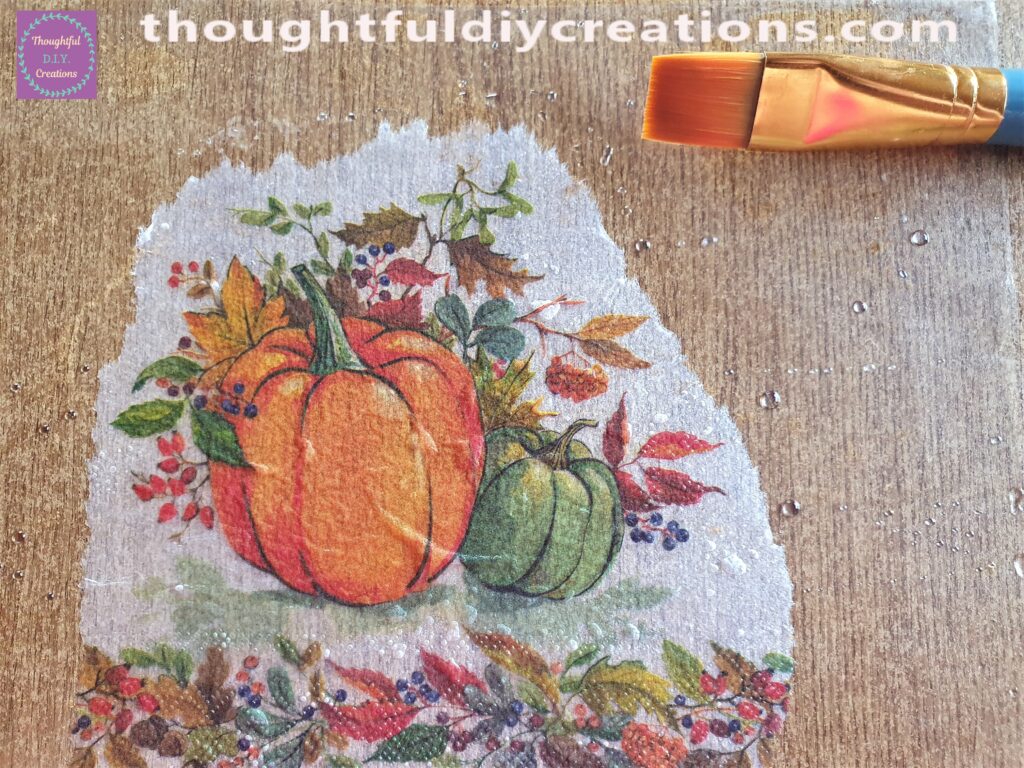 I got a dry, flat paintbrush and started to carefully brush the wrinkles out of the Napkin.