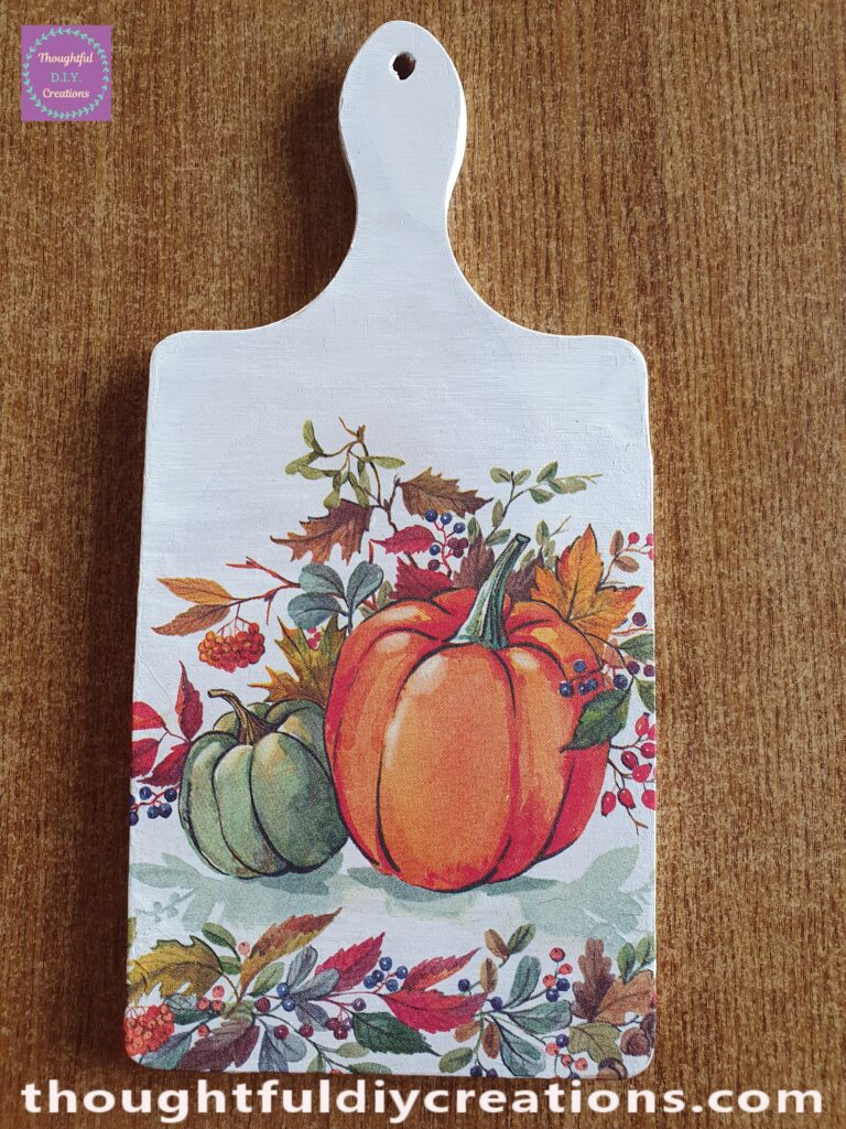 When I felt I had the Napkin Decoupaged to the Chopping Board; I removed the Plastic Sheet.