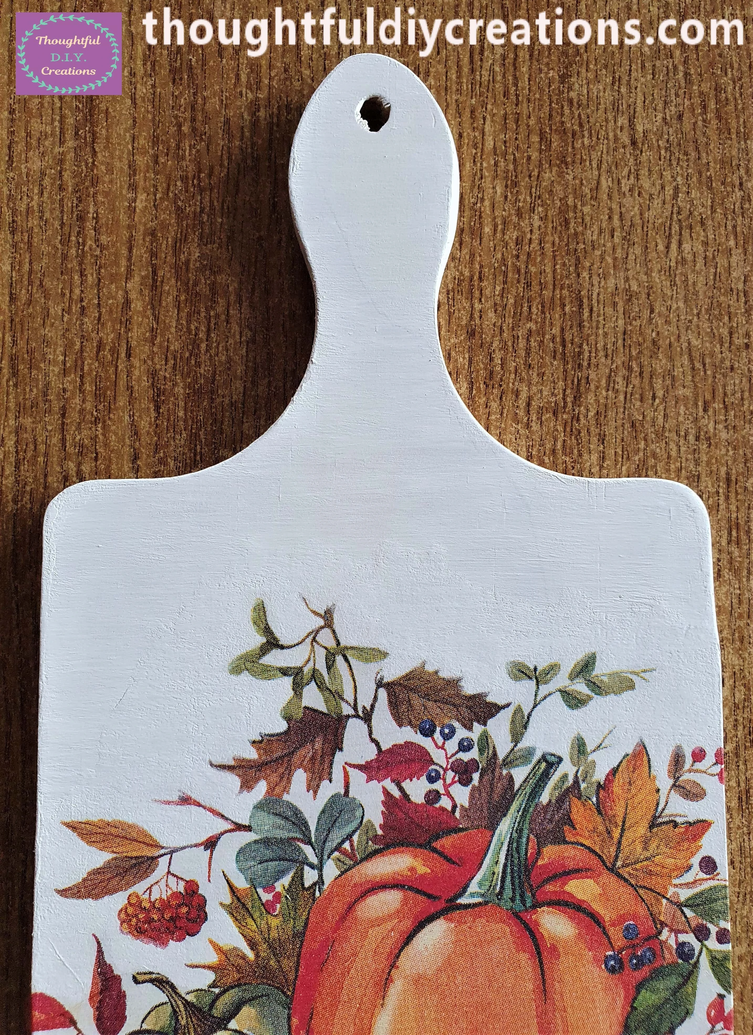 I Painted 2 layers of white paint over the white parts on the top of the Napkin and the Top area of the Chopping Board to blend it all together.