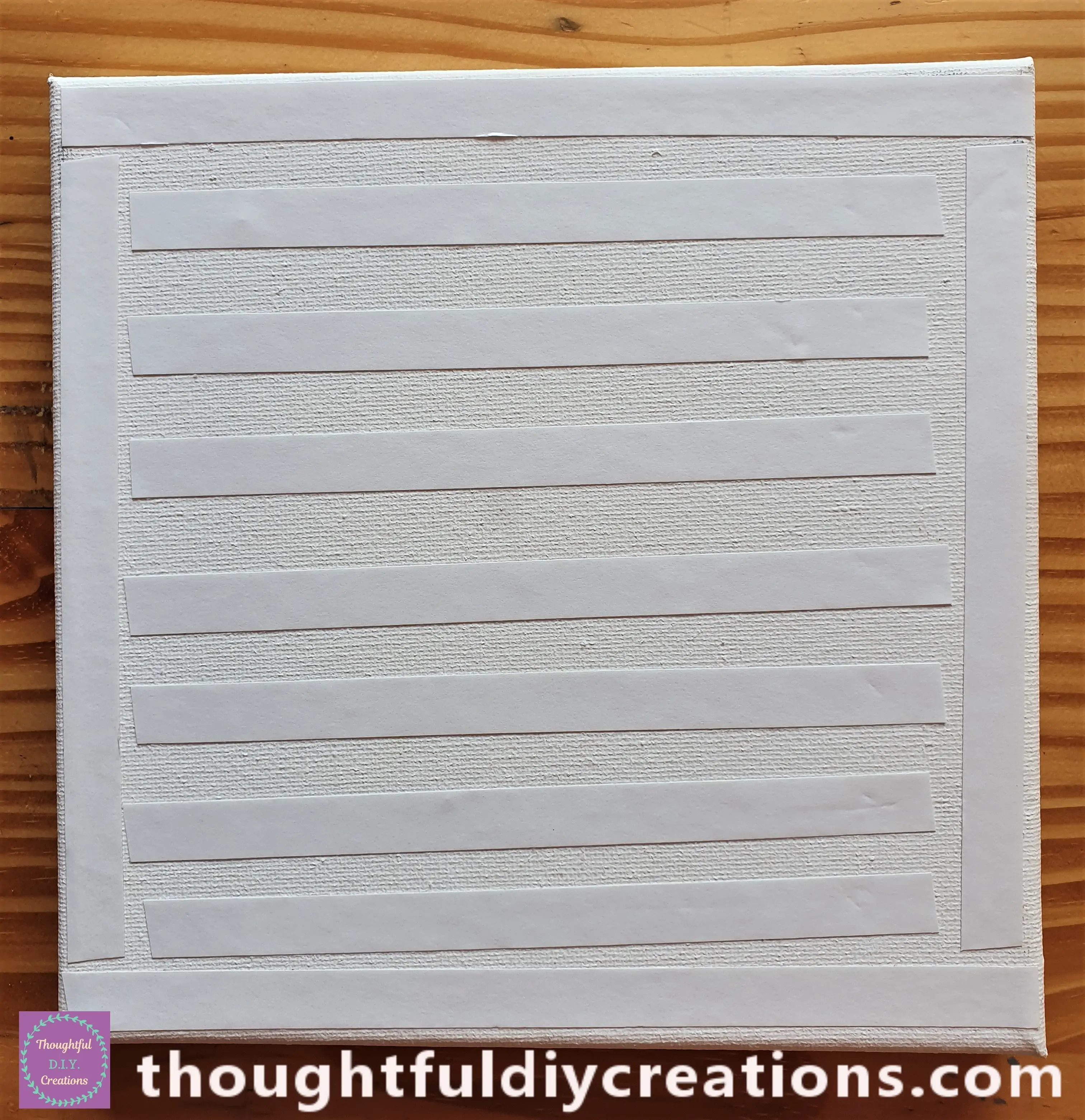 I put Strips of Double- Sided Tape all over the Canvas.