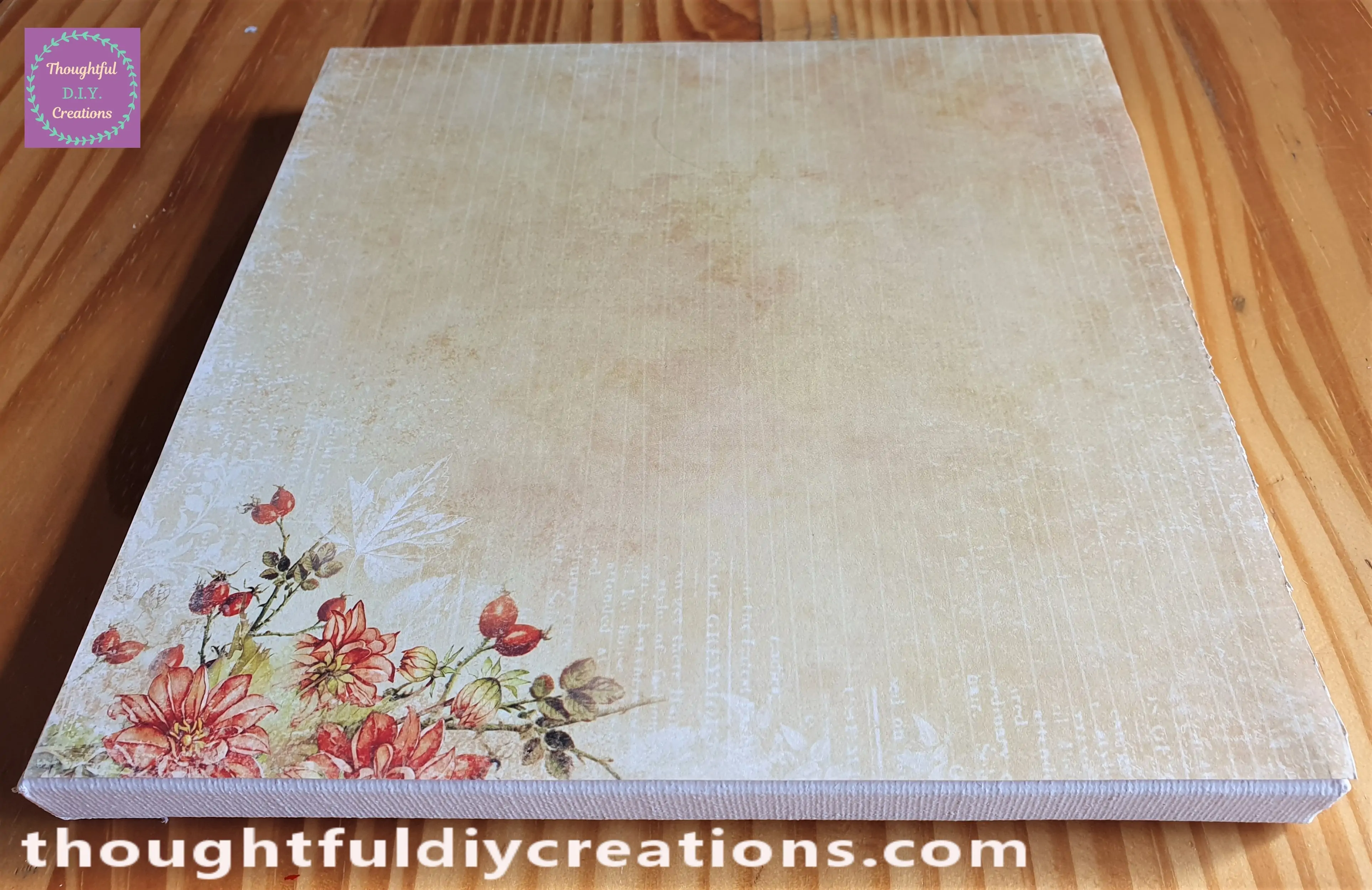 There was a slight overlap of the Paper on the Top of the Canvas so I trimmed the excess with a Scissors.