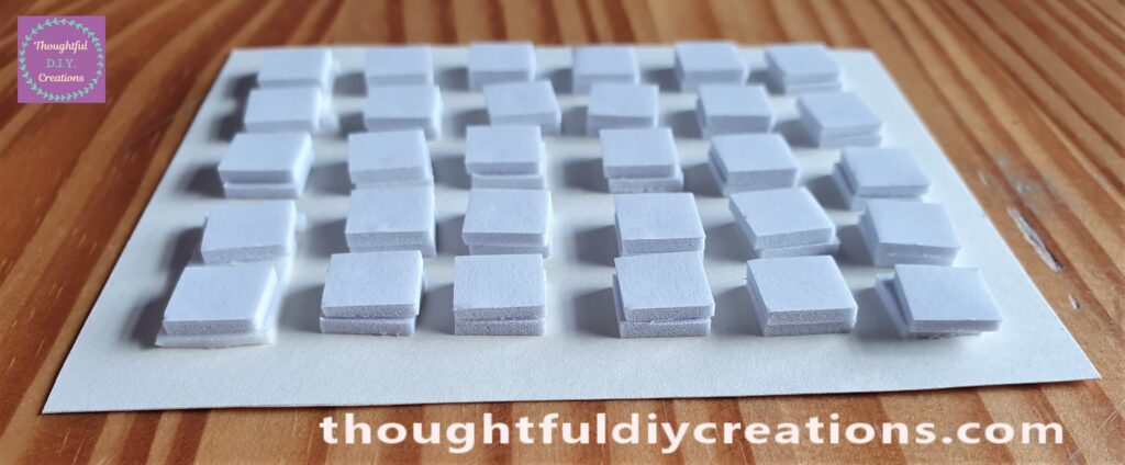 I put 2 layers of Double-Sided Foam Squares on the back of the Cream Card to give it more Dimension.